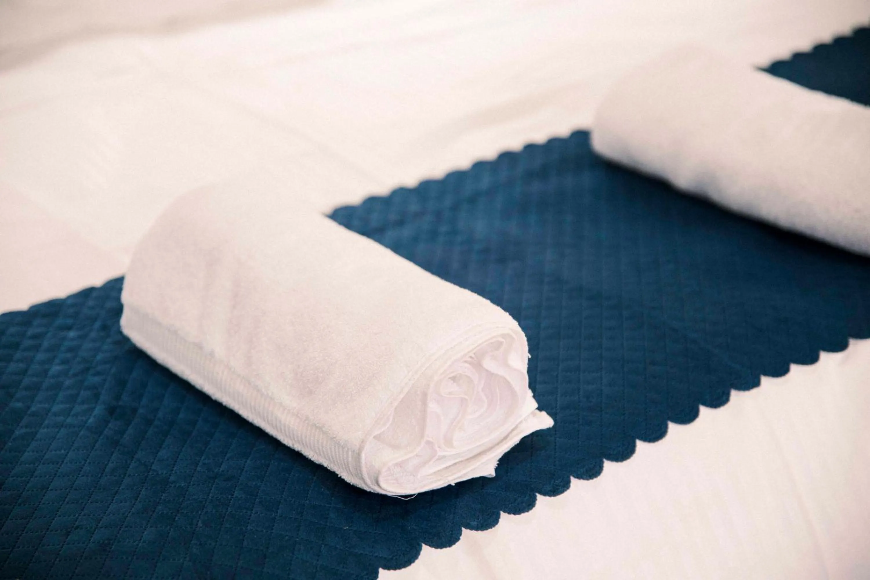 towels, Bed in The Kamru Riverside Camps and Resorts