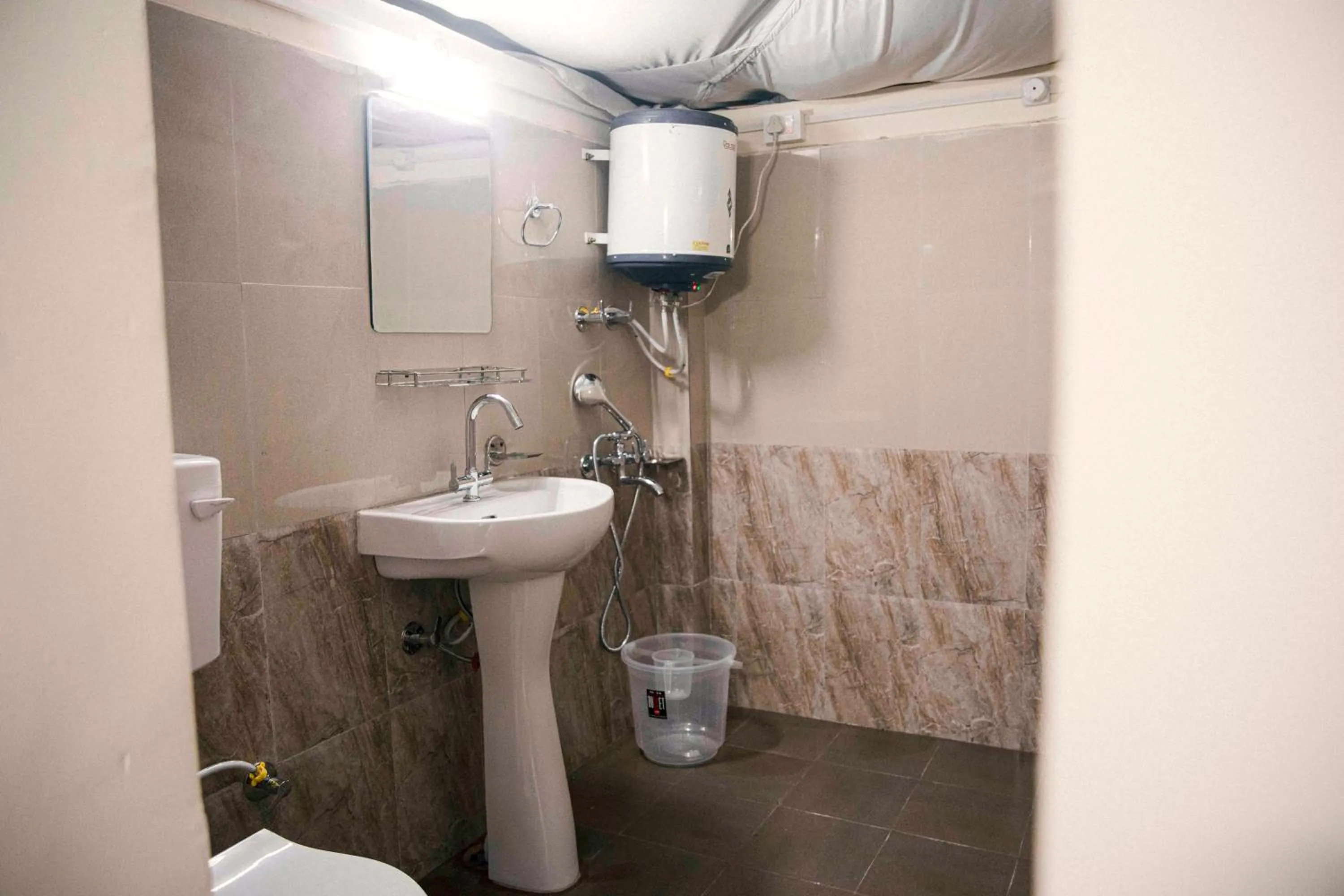 Bathroom in The Kamru Riverside Camps and Resorts