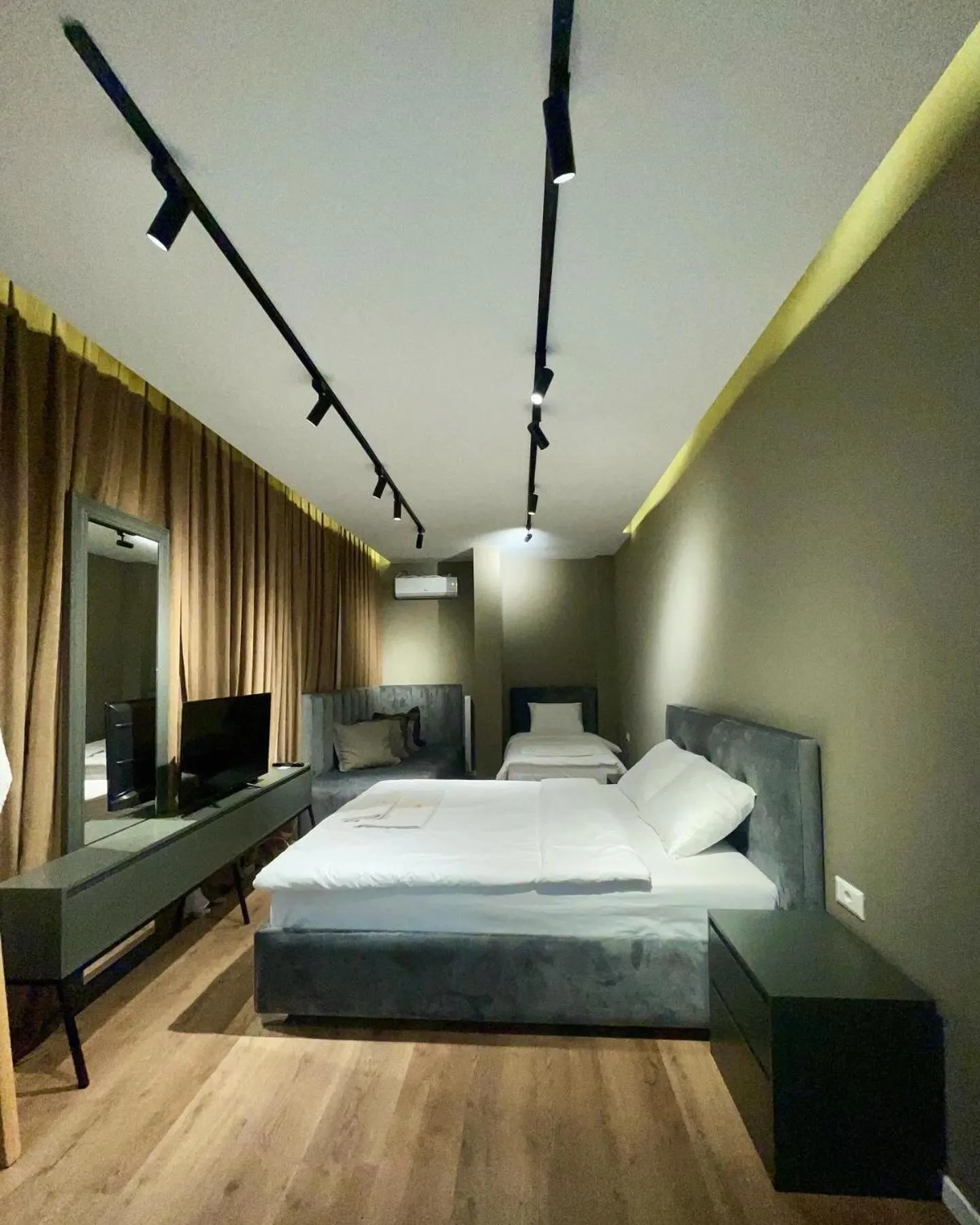 Bed in GRAND JNK Boutique Hotel