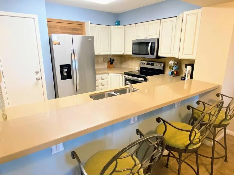 Kitchen or kitchenette in Summer House 109 - Beach and Pool Walkout - 30 Seconds to Sand