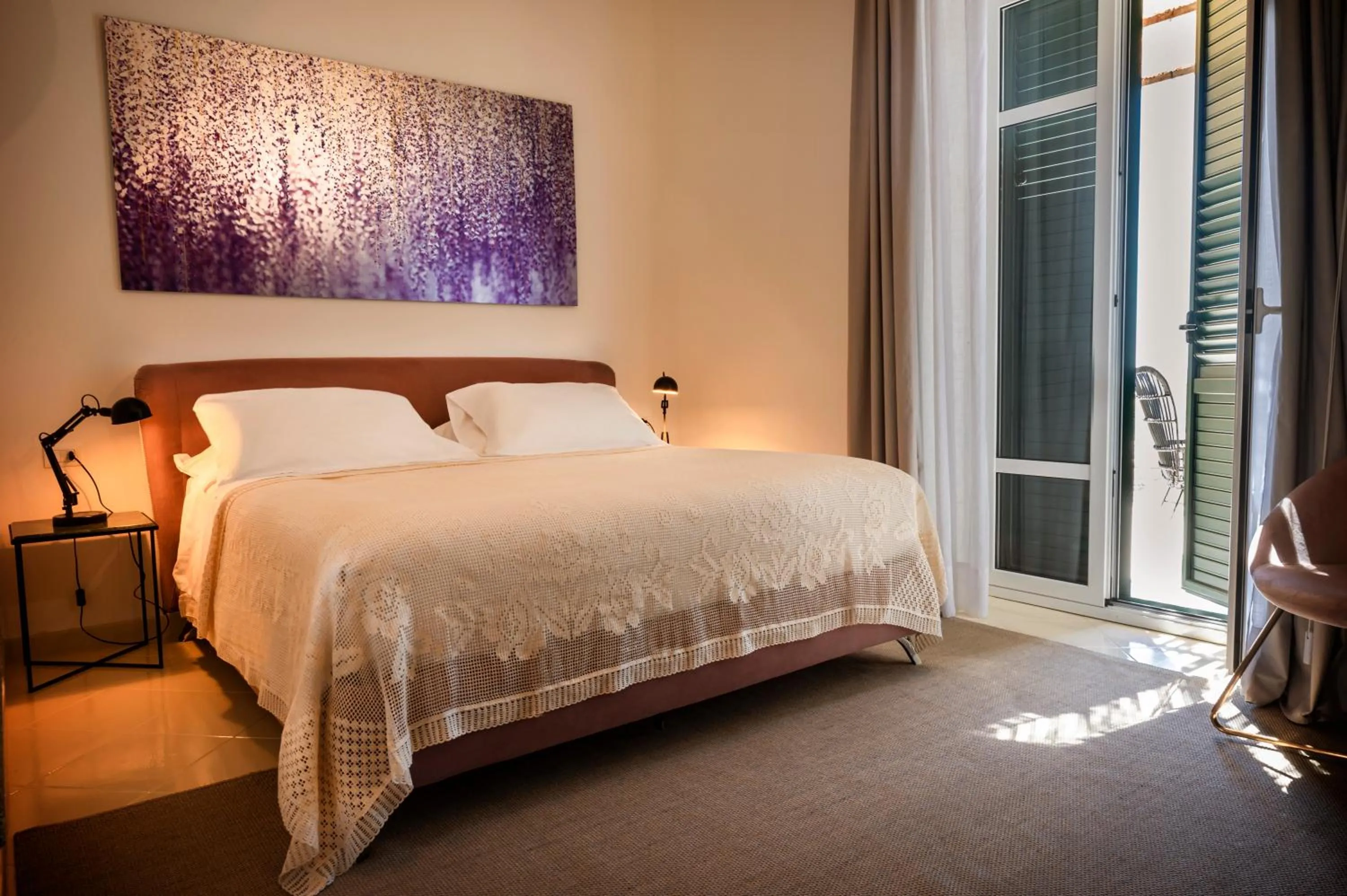 Bed in Aria Rooms and Terrace