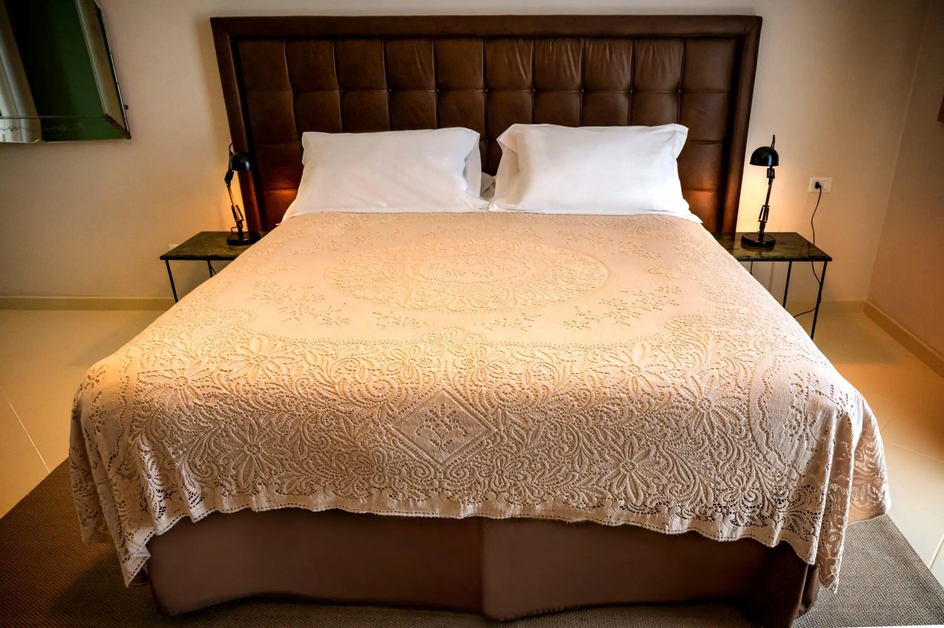 Bed in Aria Rooms and Terrace