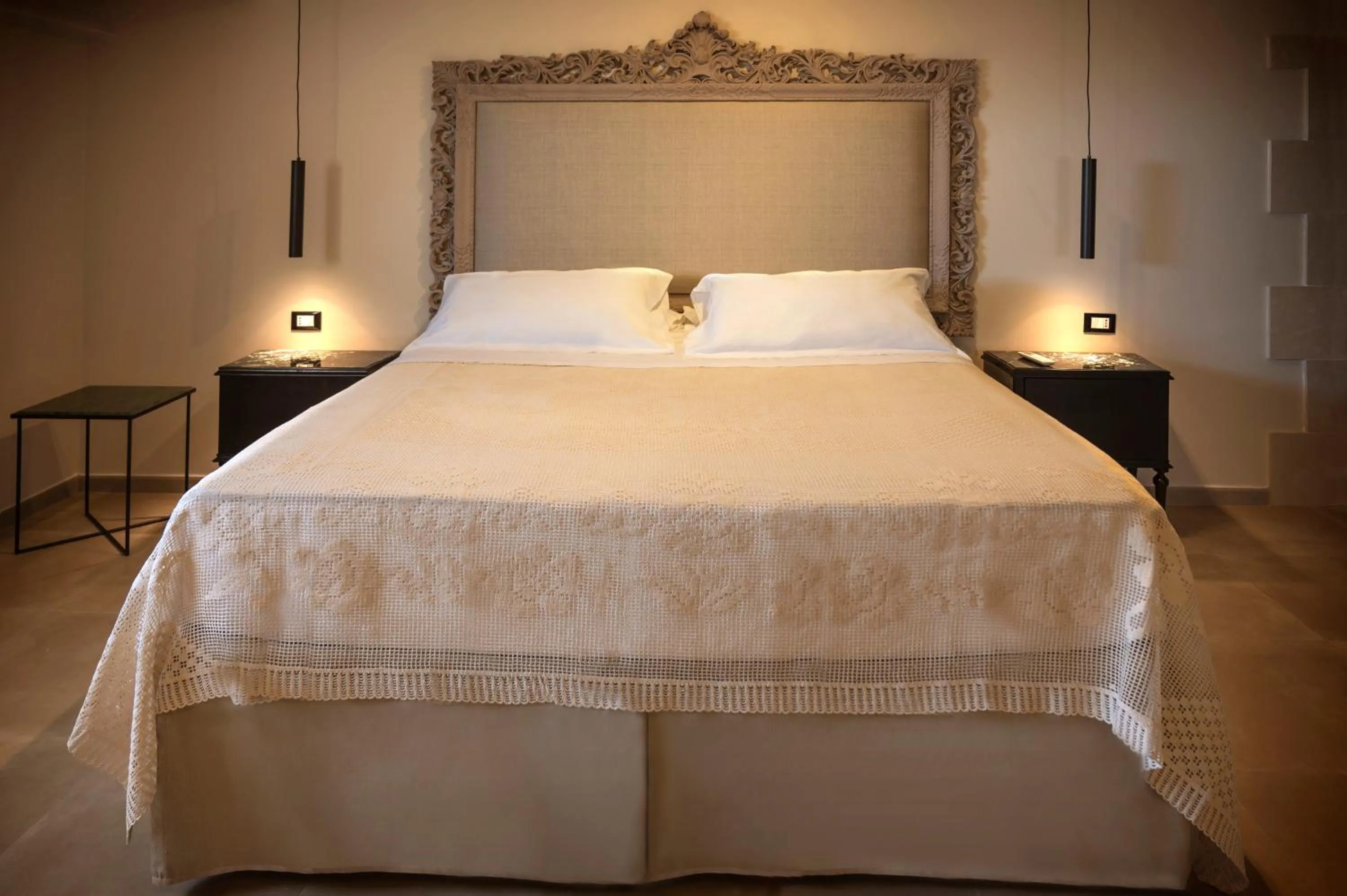 Bed in Aria Rooms and Terrace