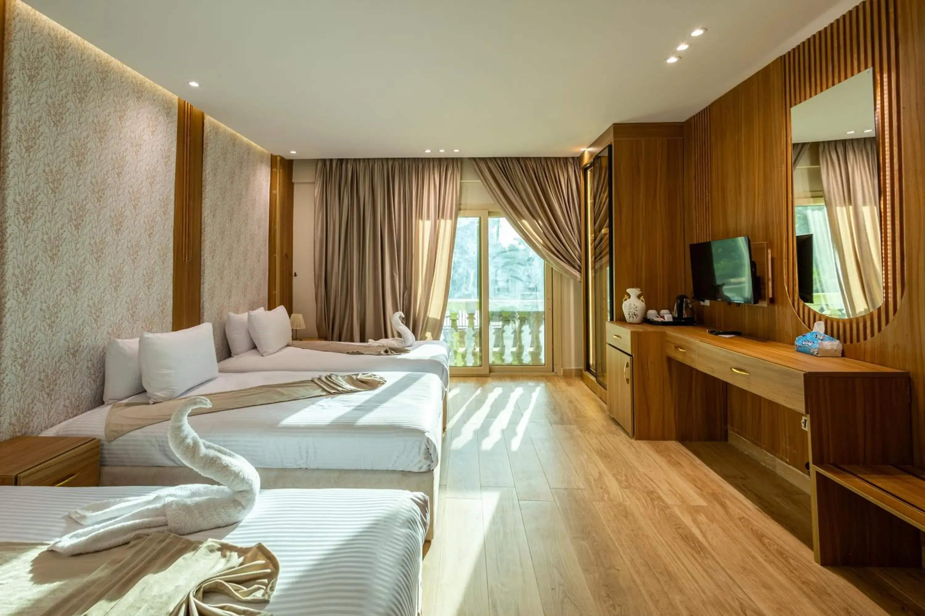 Triple Room with Balcony - Pyramids View in Pyramids sunrise inn Triple Room with Balcony - Pyramids View in Pyramids sunrise inn