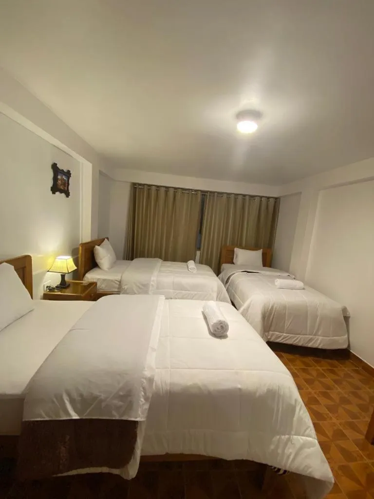 Bed in Inka House Hotel