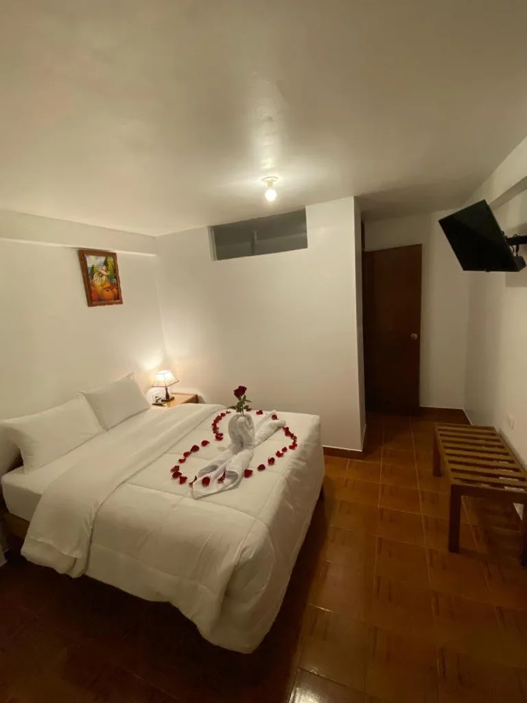 Bed in Inka House Hotel