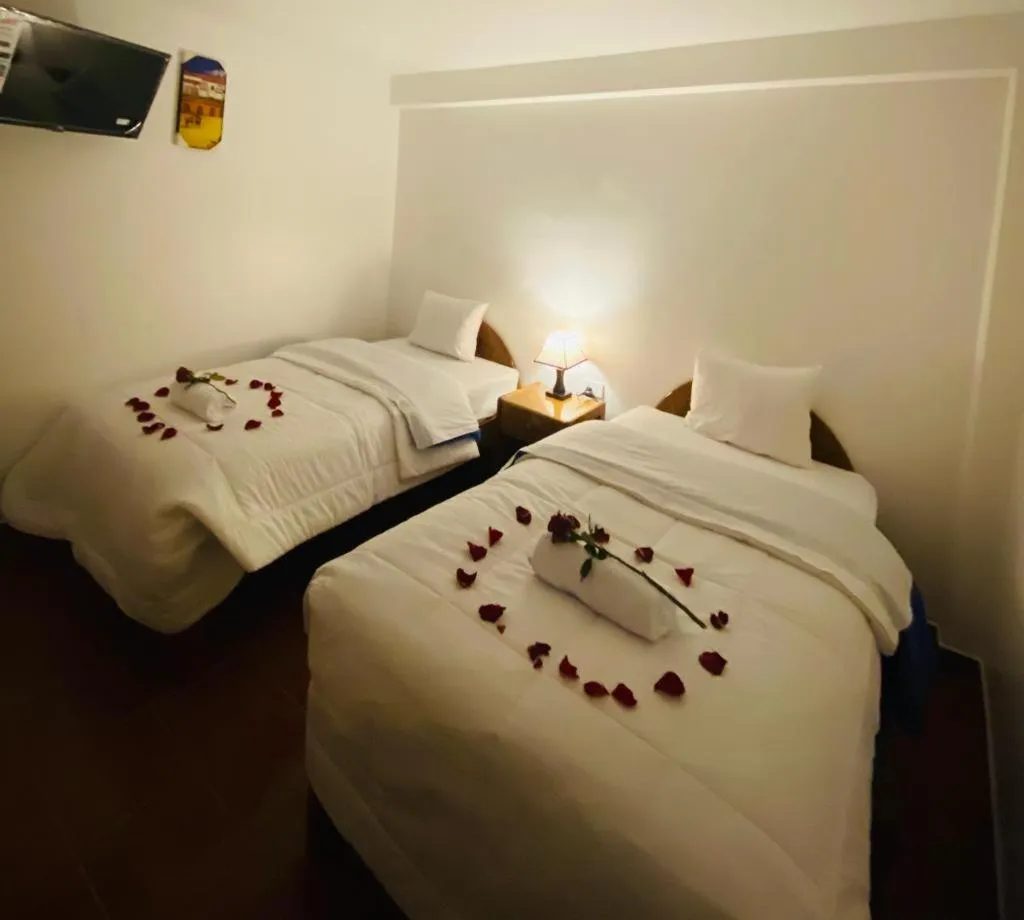 Bed in Inka House Hotel