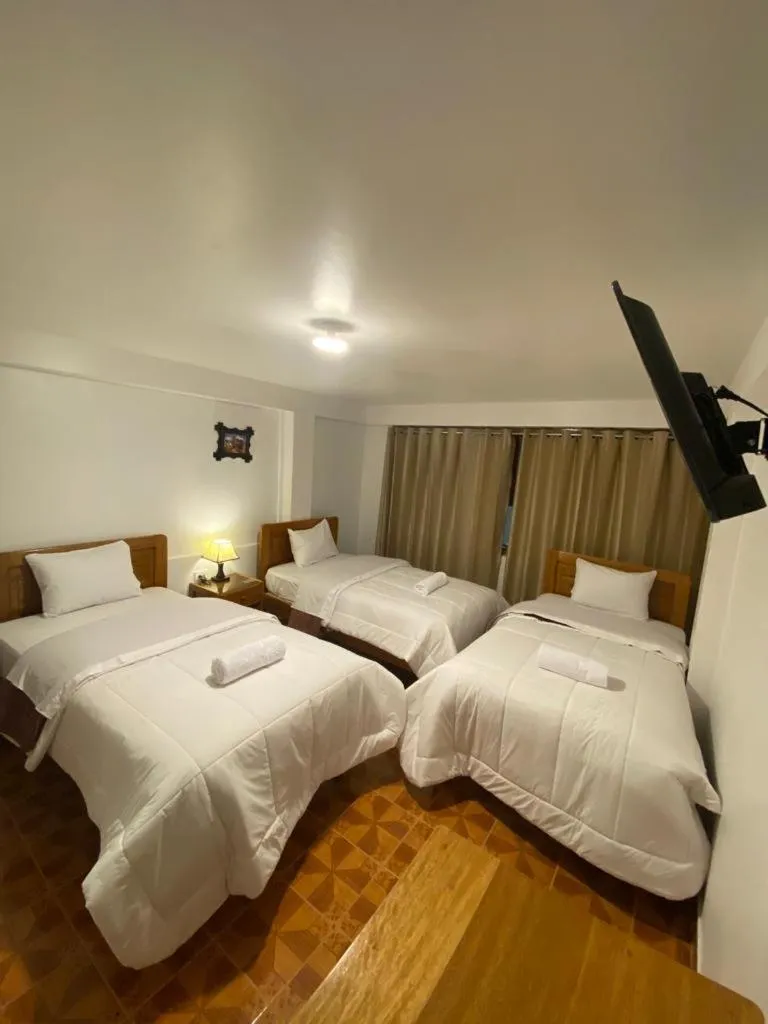 Bed in Inka House Hotel