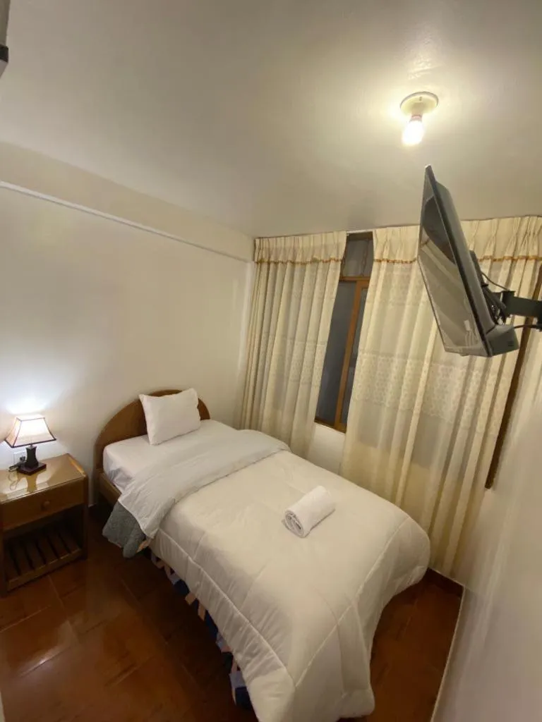 Bed in Inka House Hotel