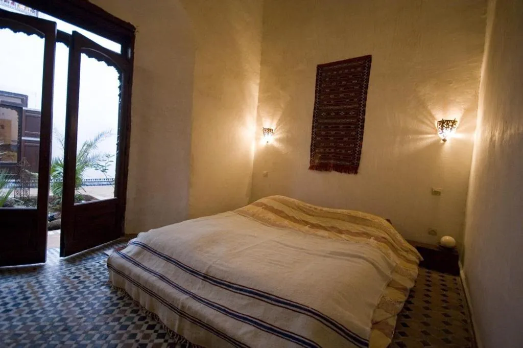 Photo of the whole room, Bed in Riad Felloussia