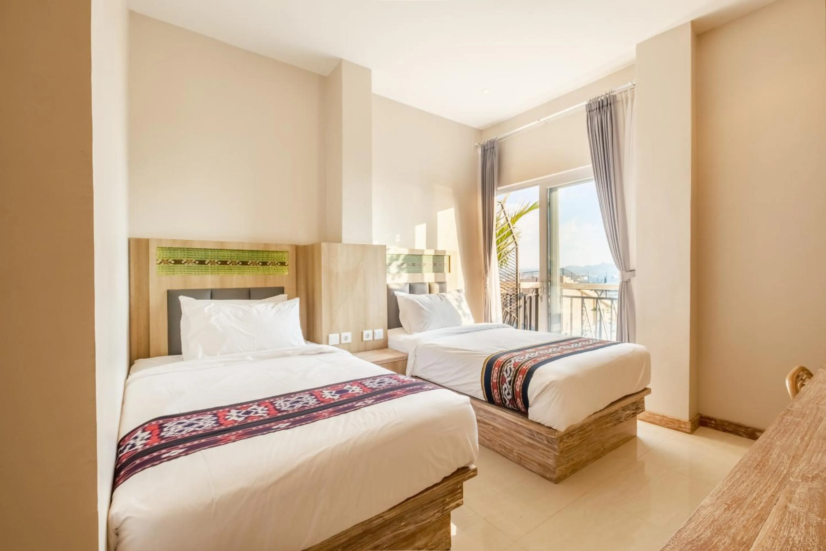 Bed in DEJAVU 2.0 HOTEL BAJO KOMODO