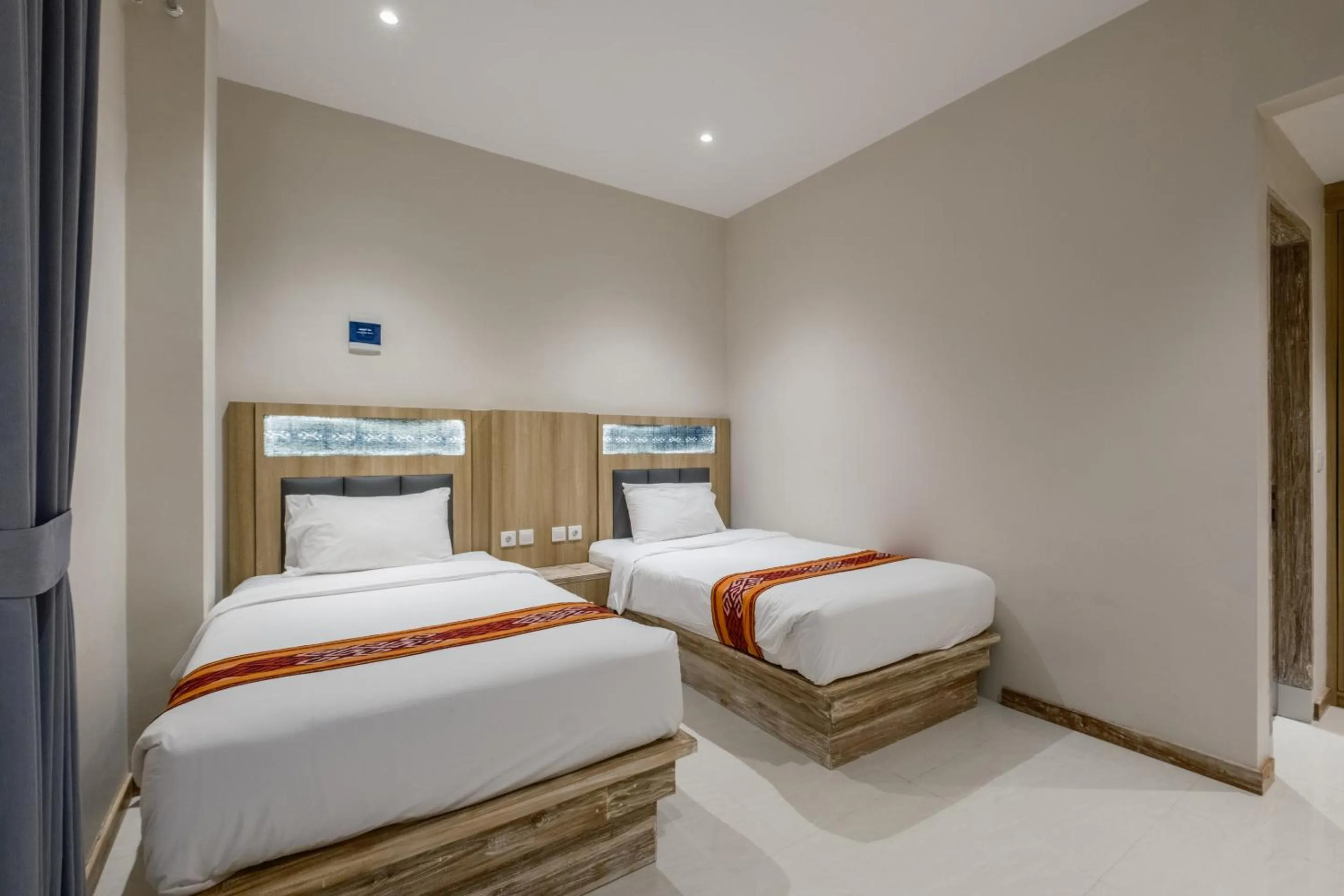 Bed in DEJAVU 2.0 HOTEL BAJO KOMODO