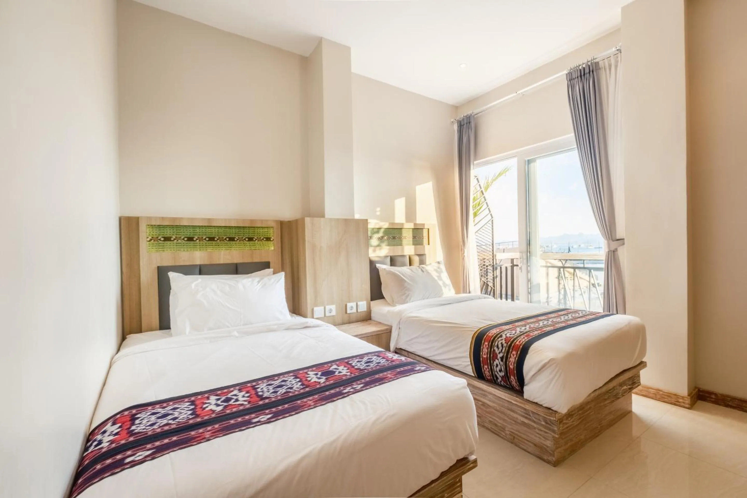 Bed in DEJAVU 2.0 HOTEL BAJO KOMODO