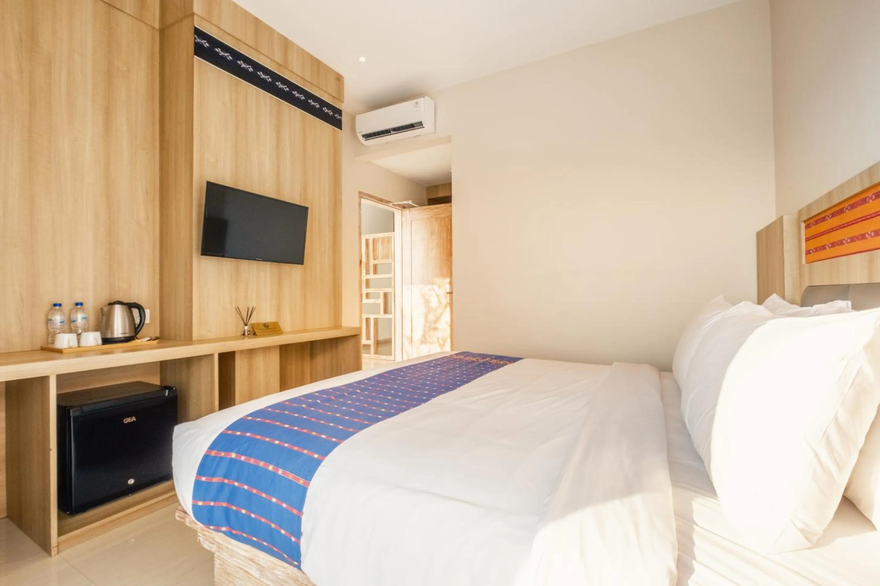 Bed in DEJAVU 2.0 HOTEL BAJO KOMODO