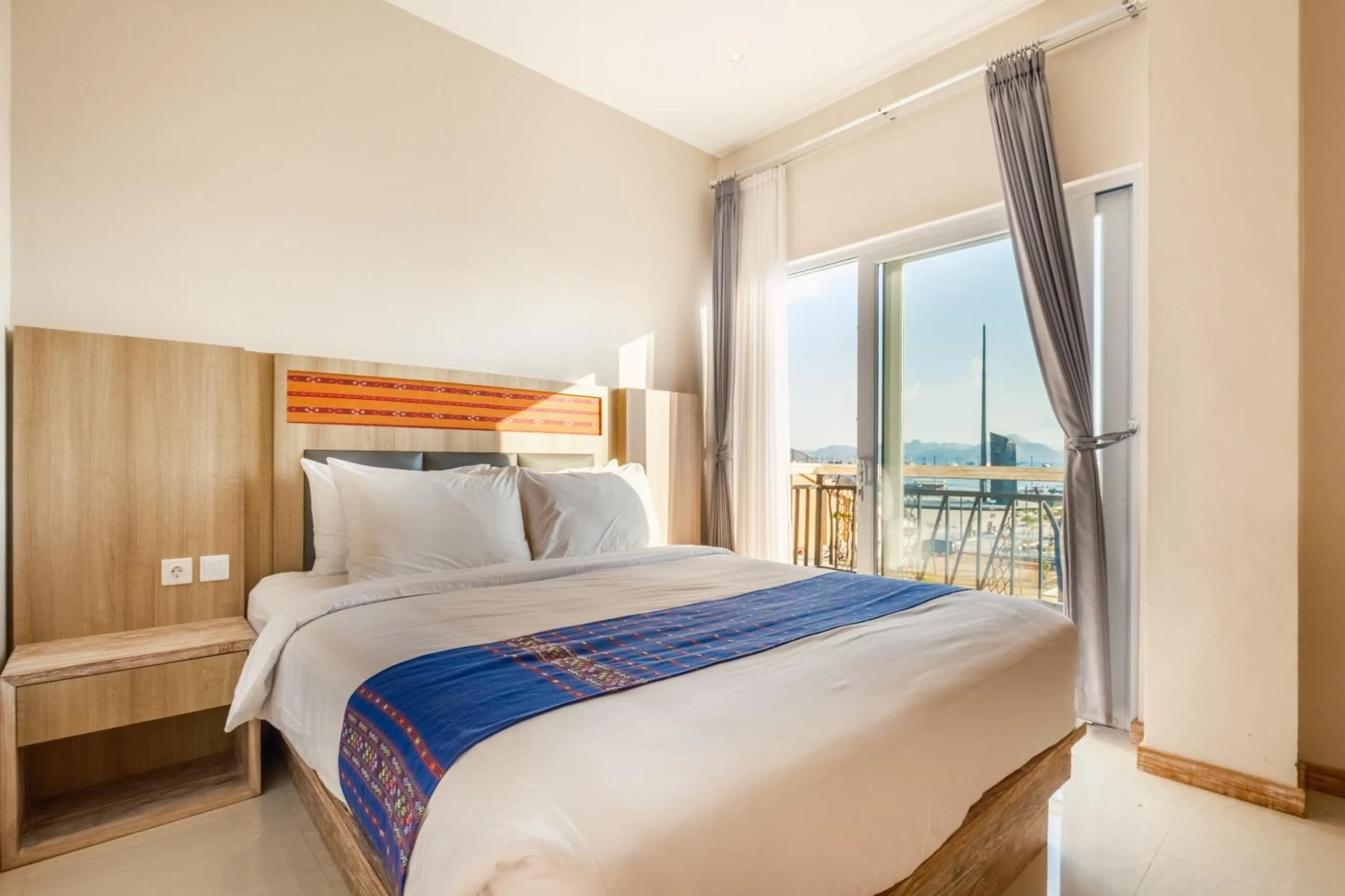 Bed in DEJAVU 2.0 HOTEL BAJO KOMODO