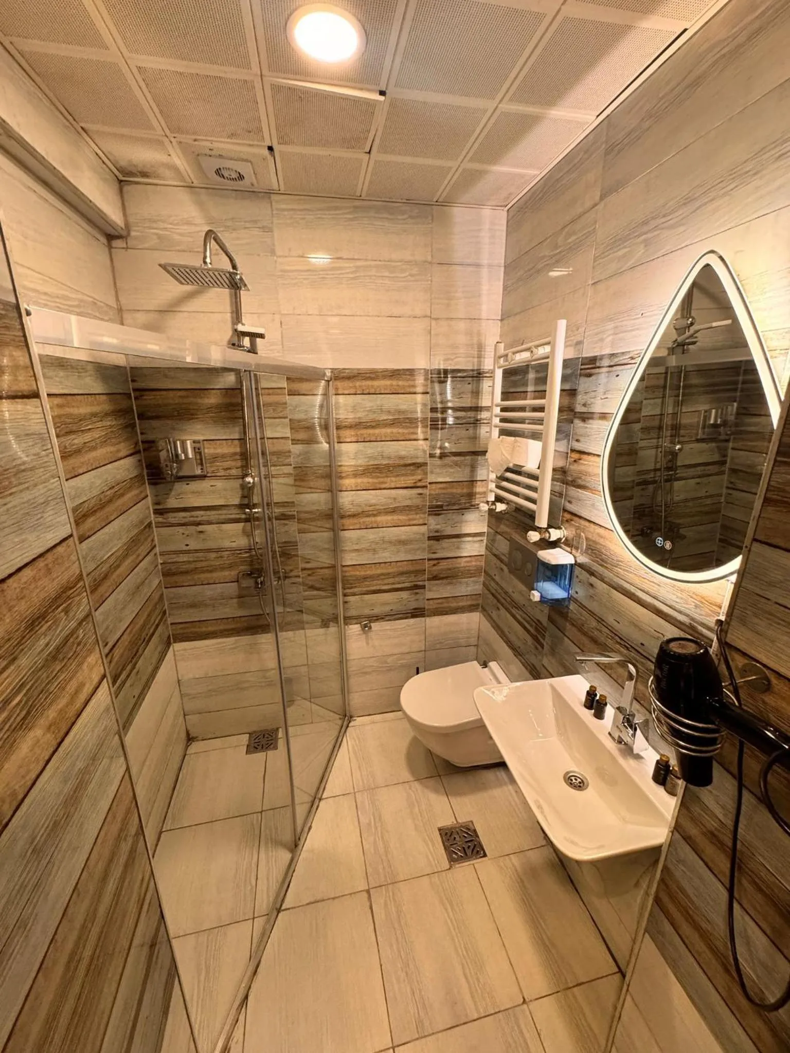 Shower in IMMORTELLE HOTEL