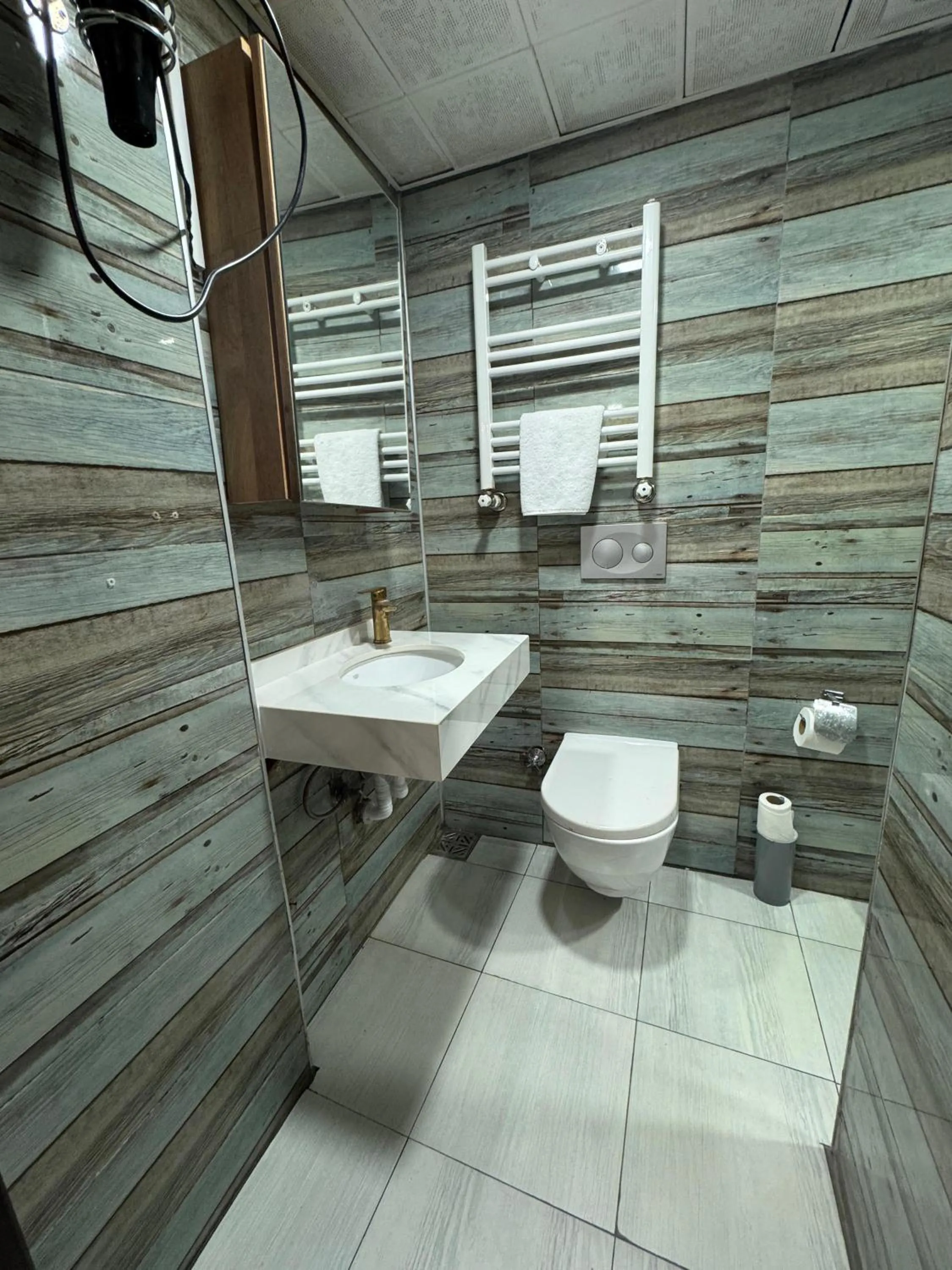 Shower in IMMORTELLE HOTEL