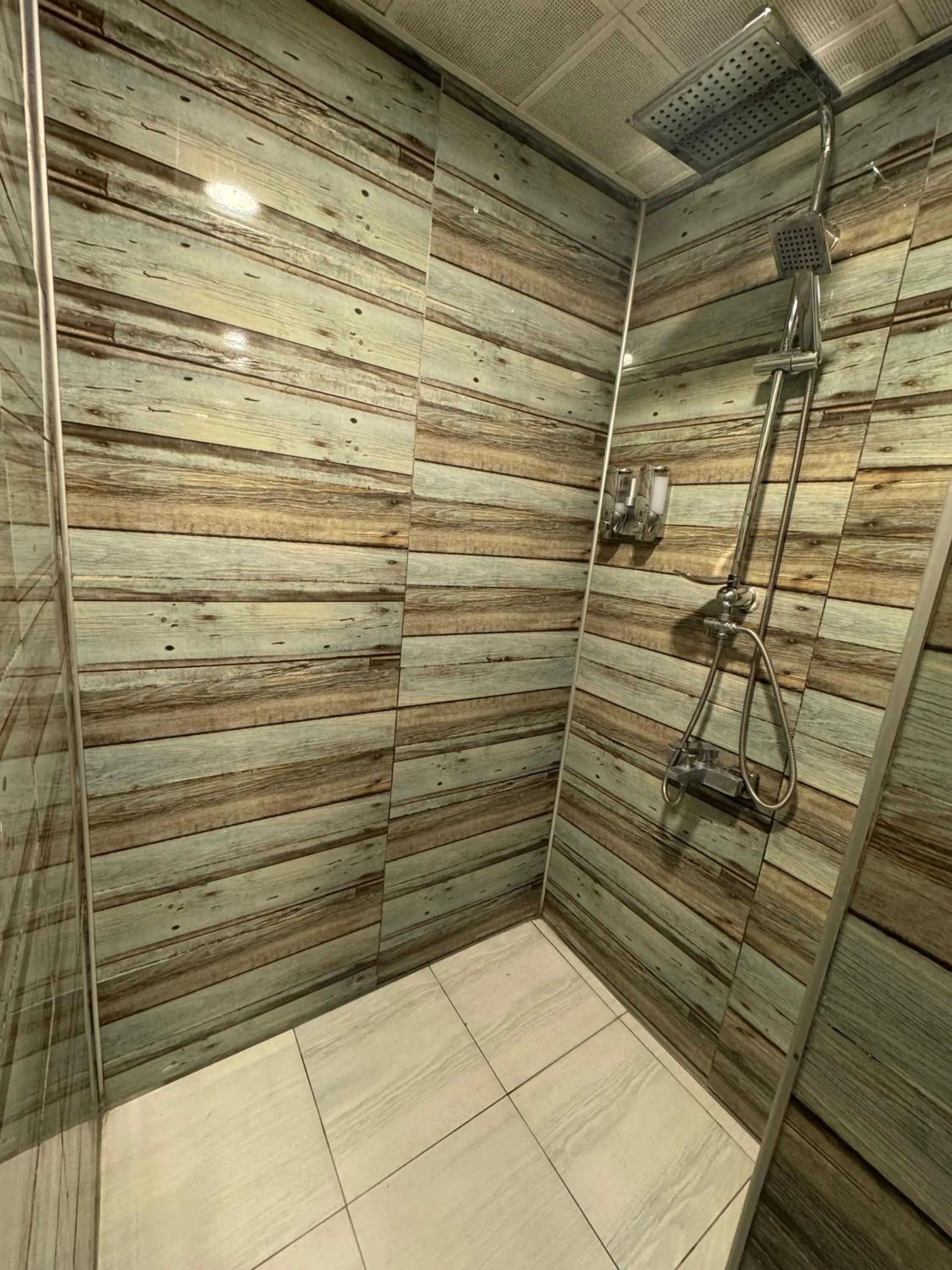 Shower in IMMORTELLE HOTEL