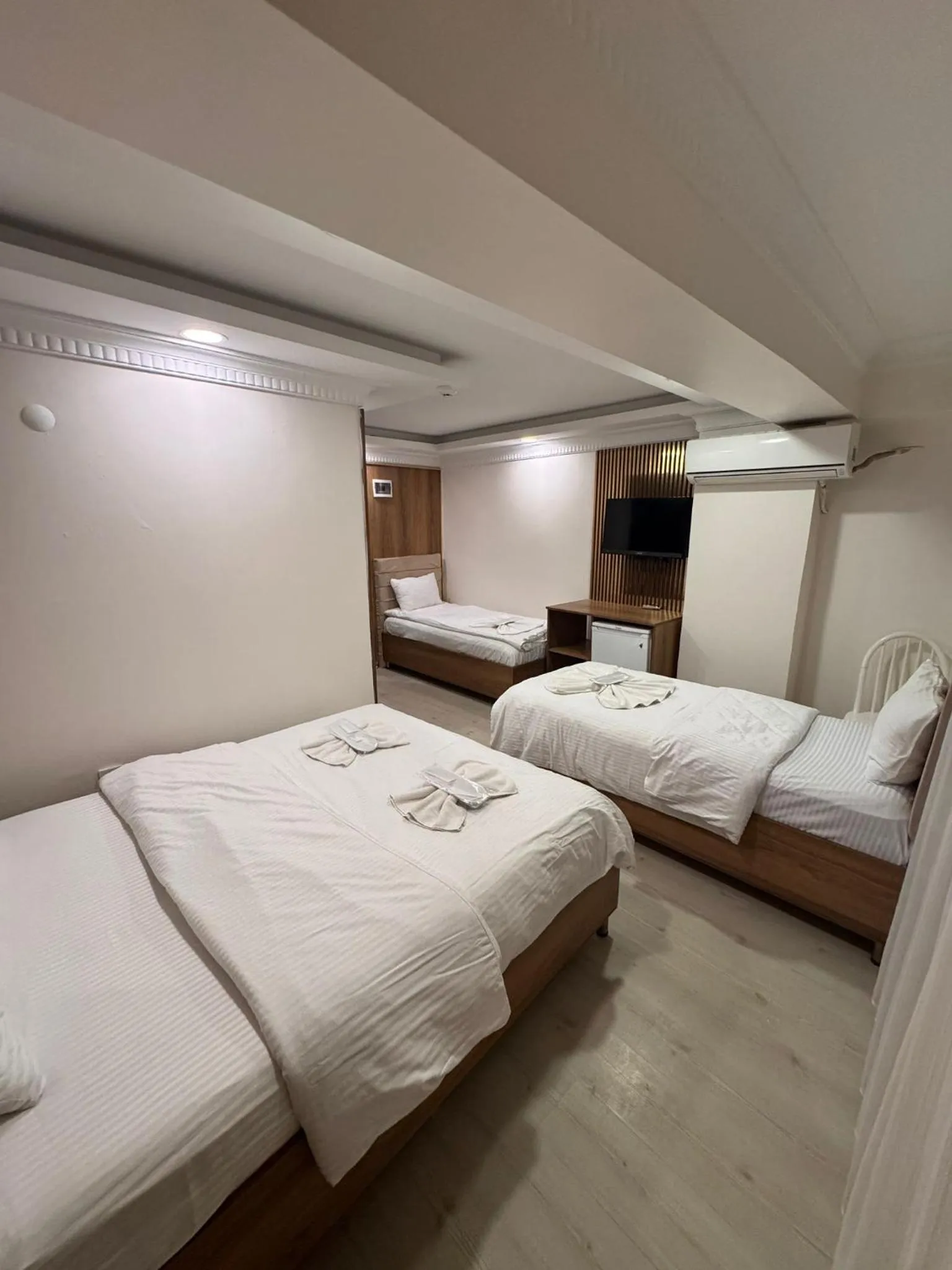 Bed in IMMORTELLE HOTEL