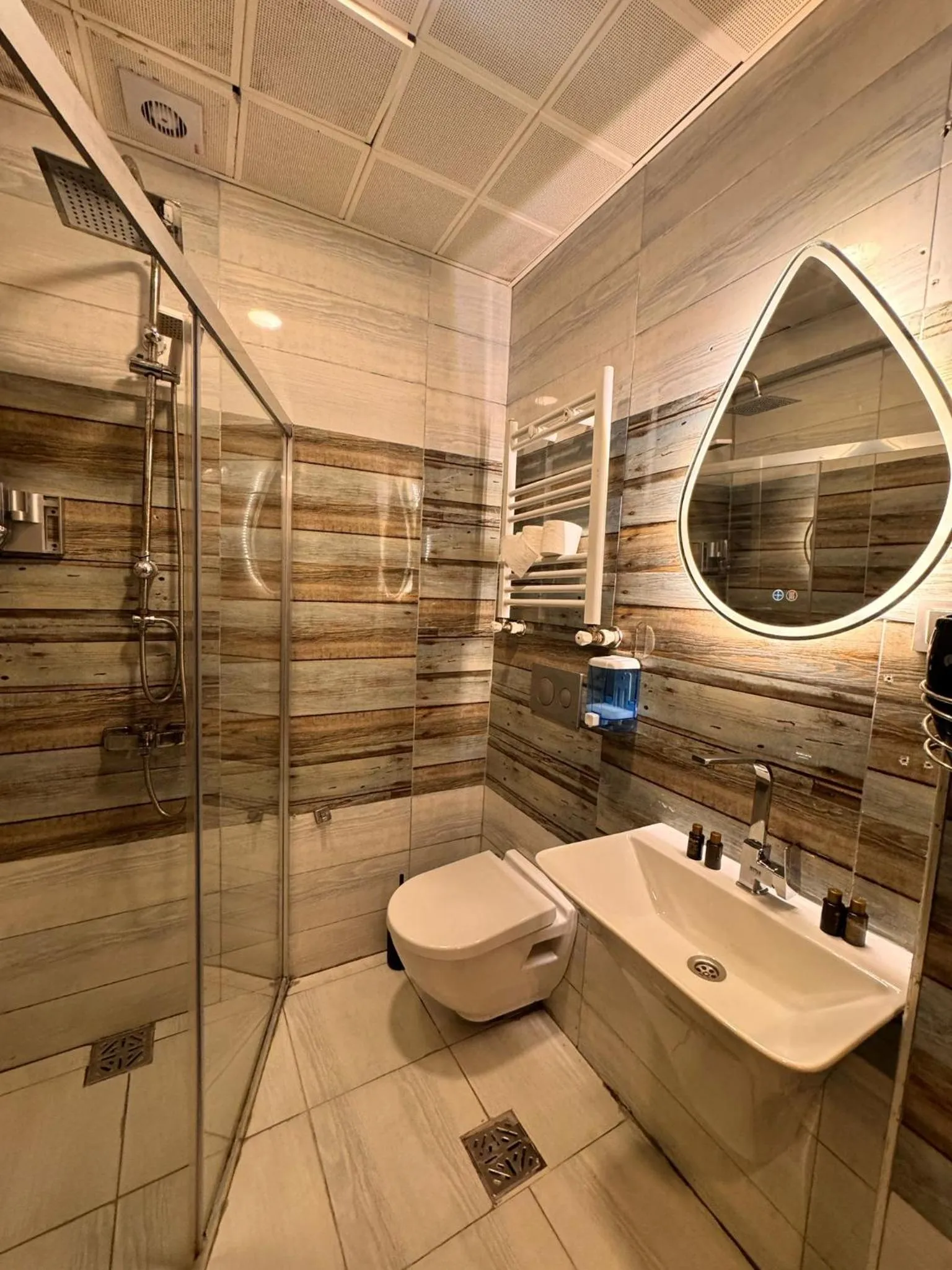 Shower in IMMORTELLE HOTEL