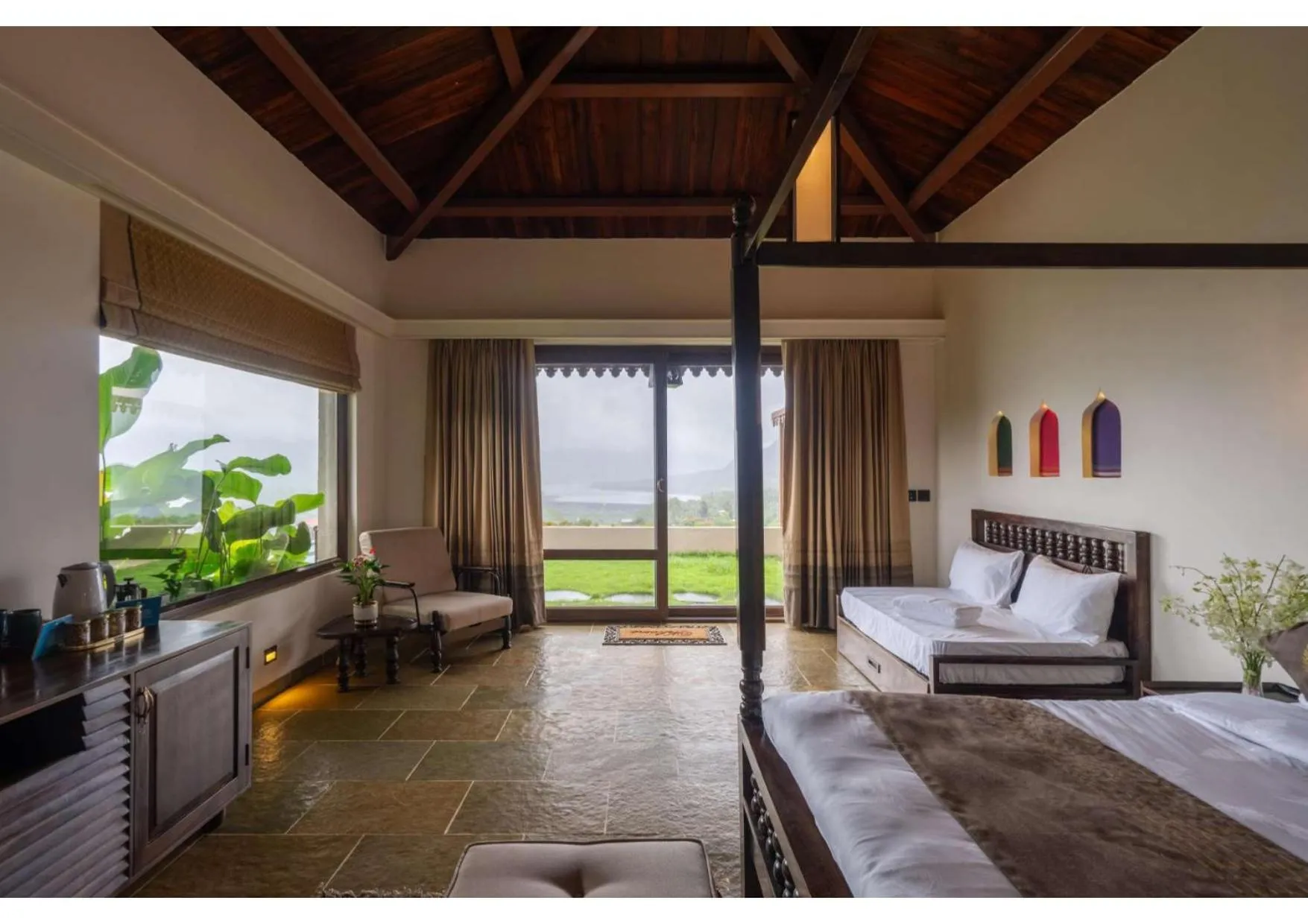 Bed in Malhar Machi Mountain Resorts