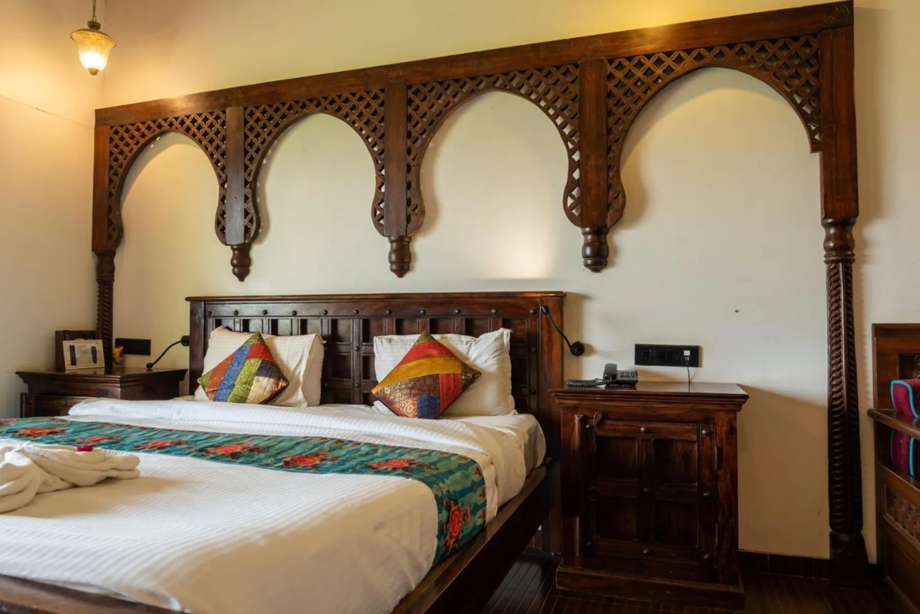Bed in Malhar Machi Mountain Resorts