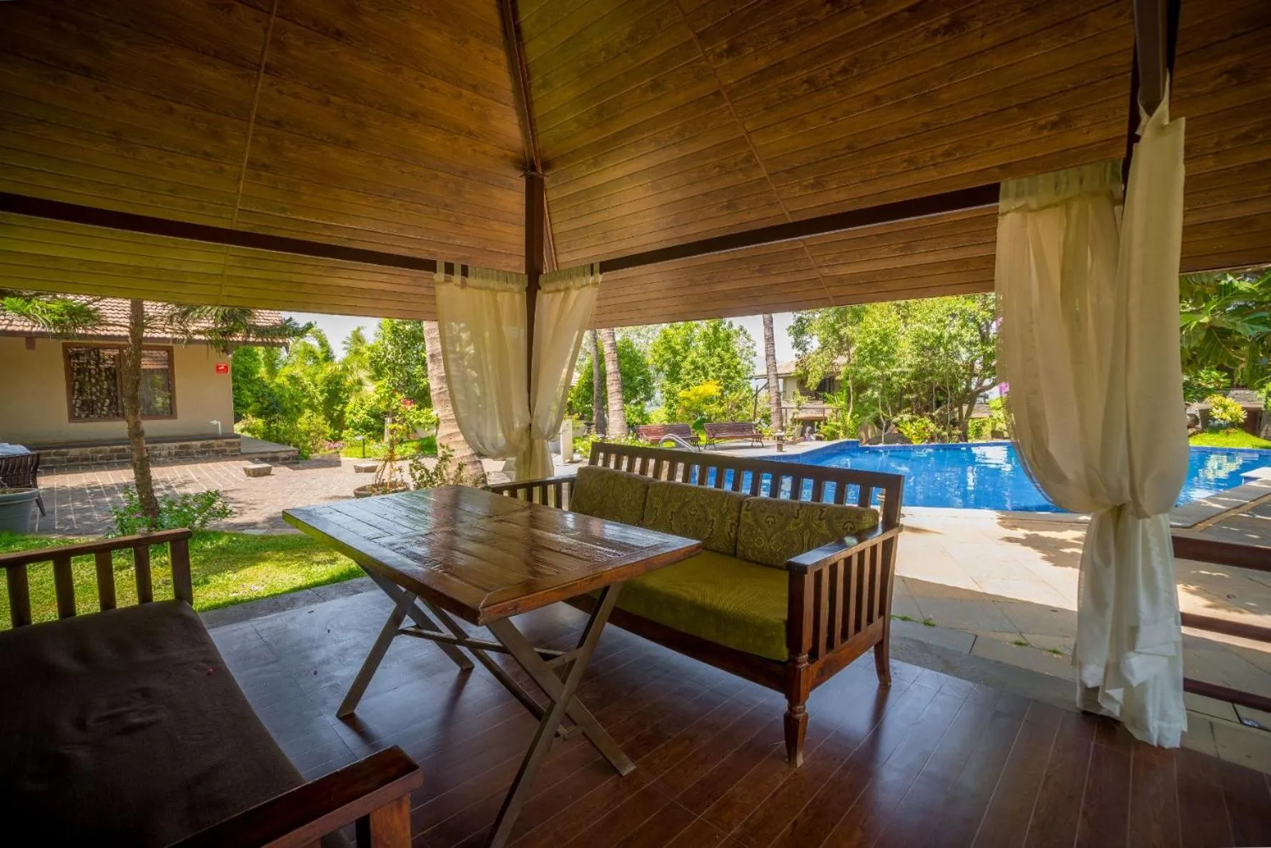 Seating area in Malhar Machi Mountain Resorts