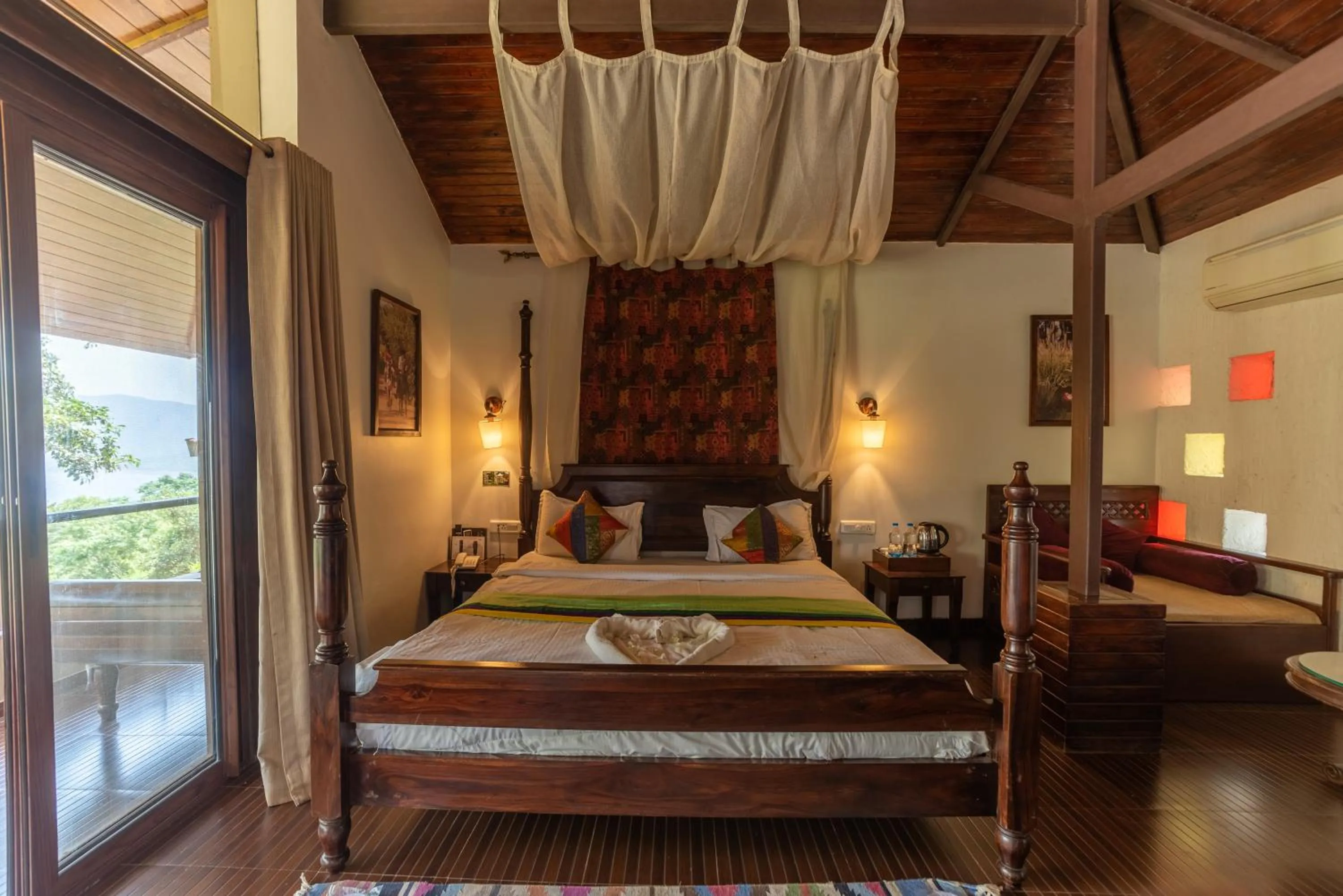 Bed in Malhar Machi Mountain Resorts