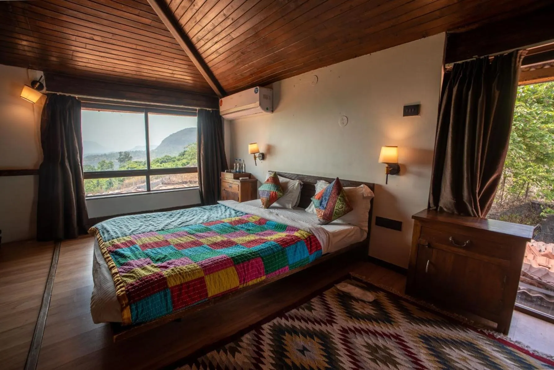 Bed in Malhar Machi Mountain Resorts
