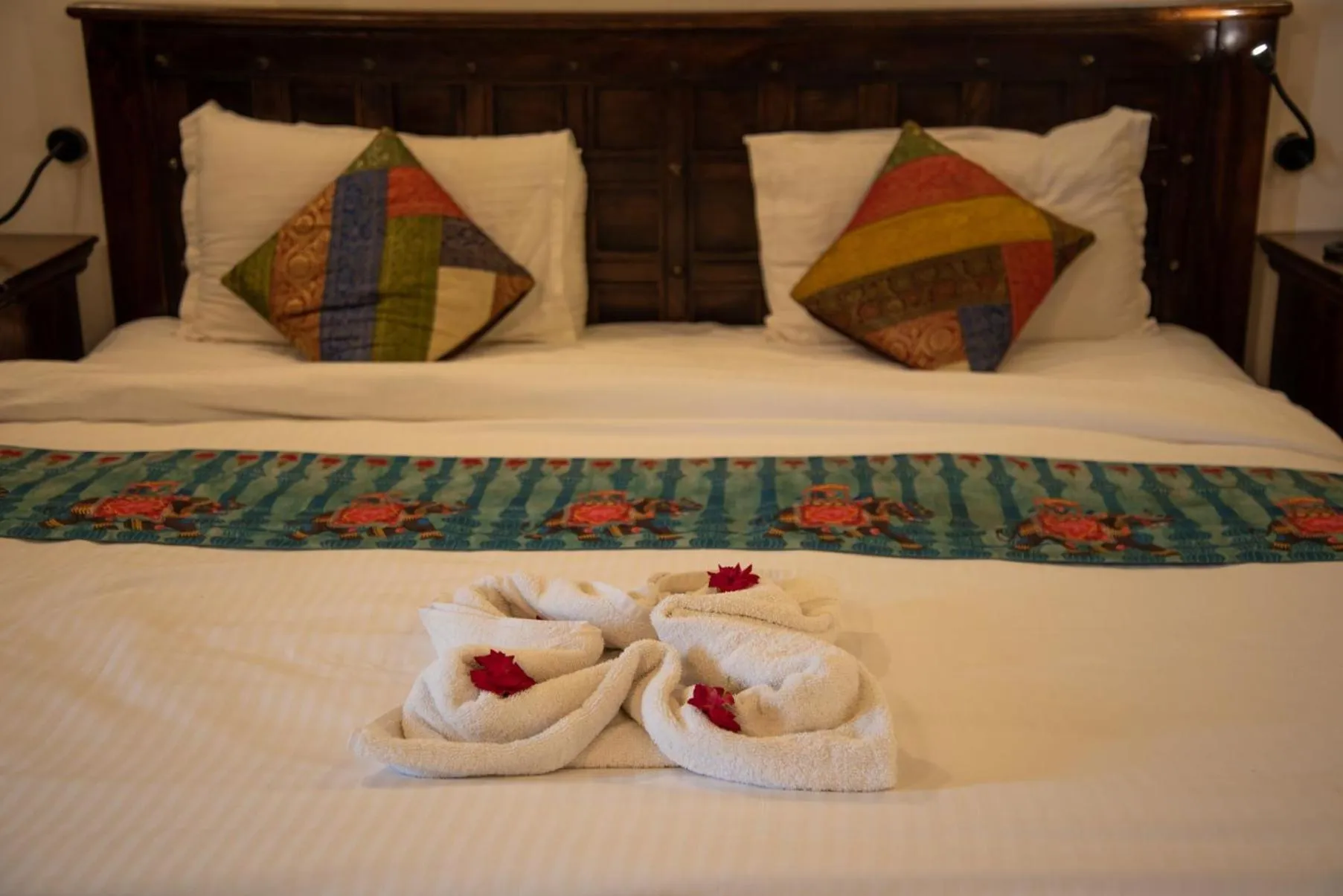 Bed in Malhar Machi Mountain Resorts