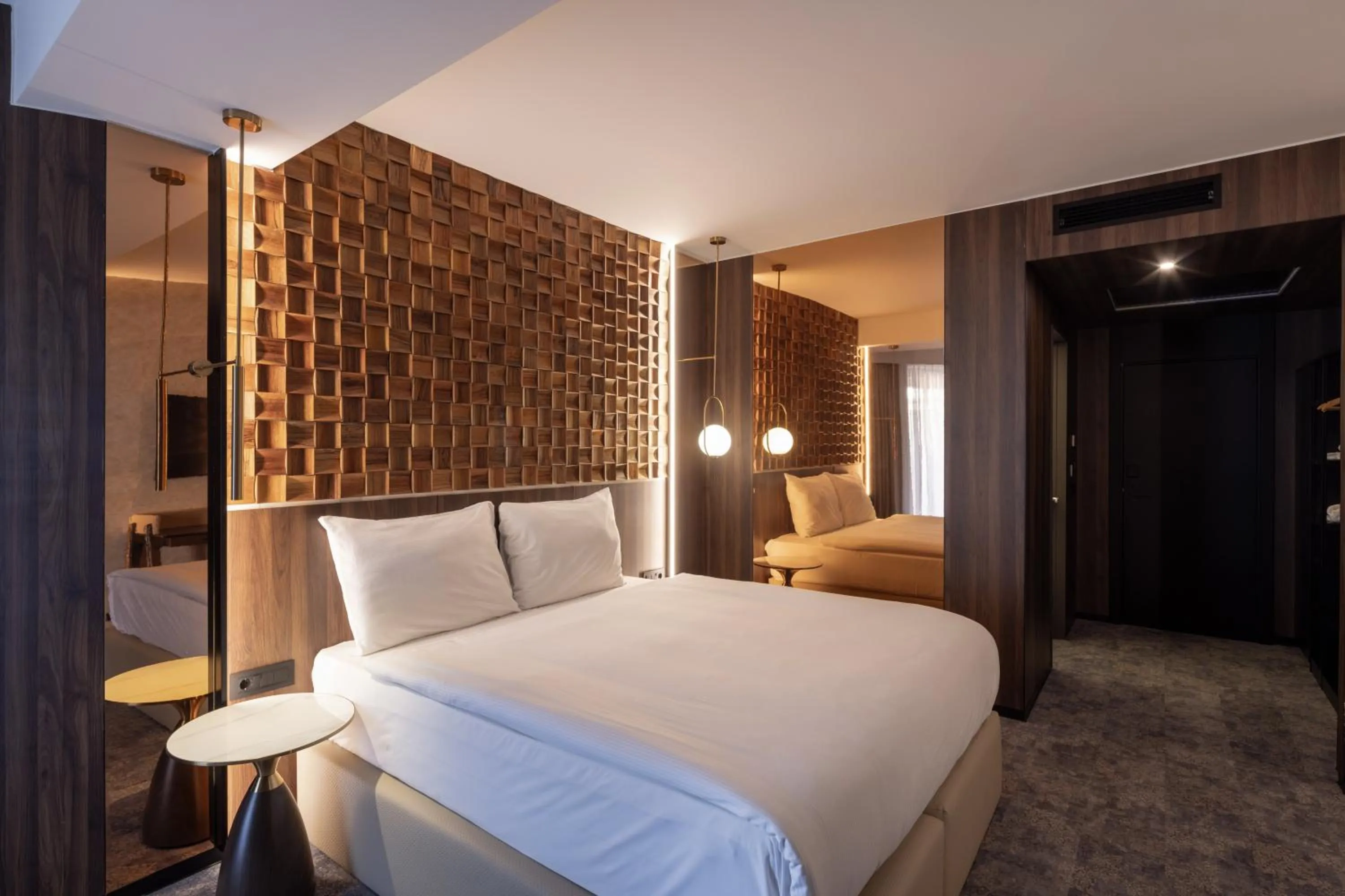 Bed in Nobel Design Hotel