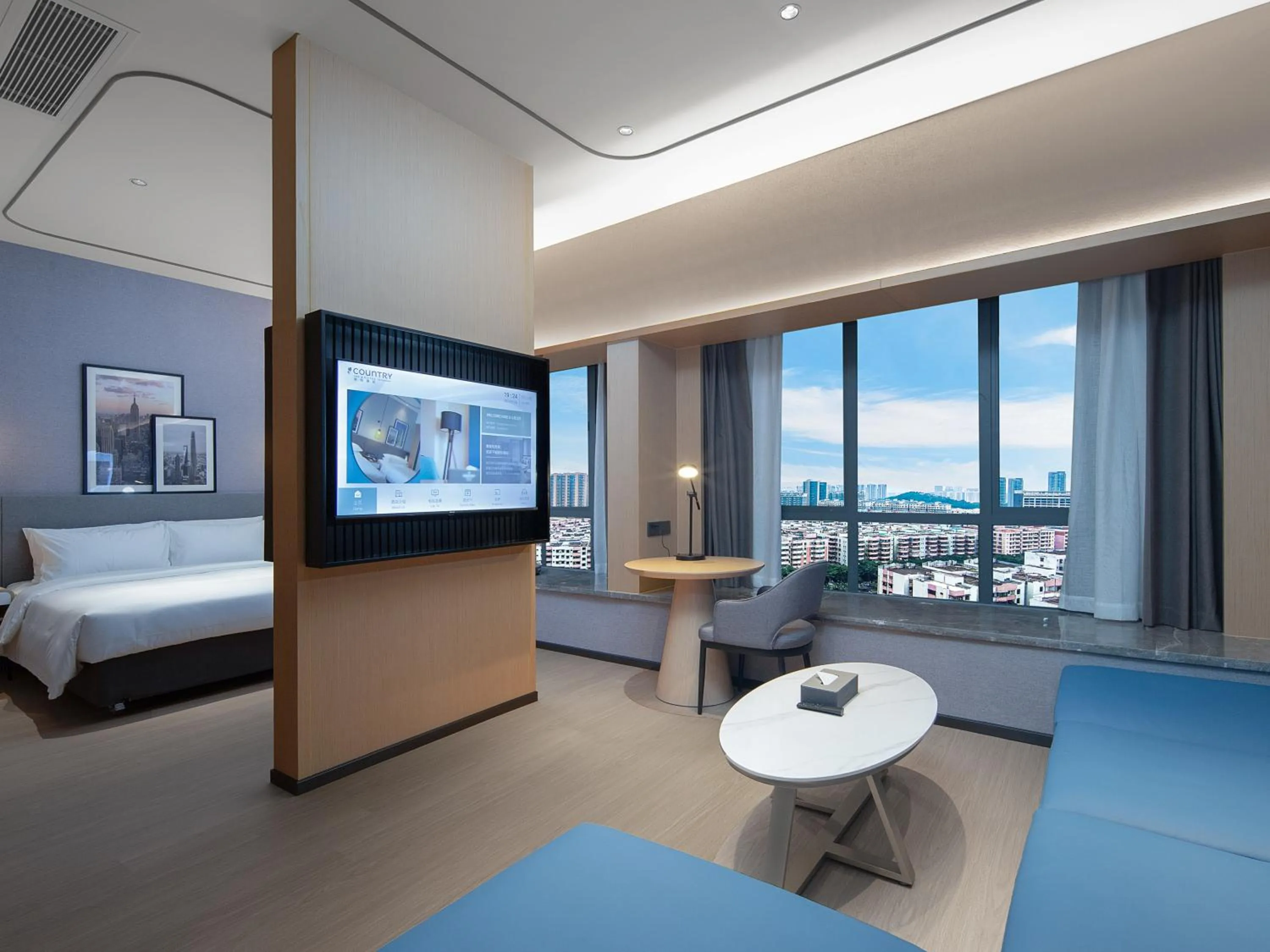 Seating area, Bed in 丽怡酒店 台山东门店 Country Inn & Suites by Radisson - Taishan East Branch