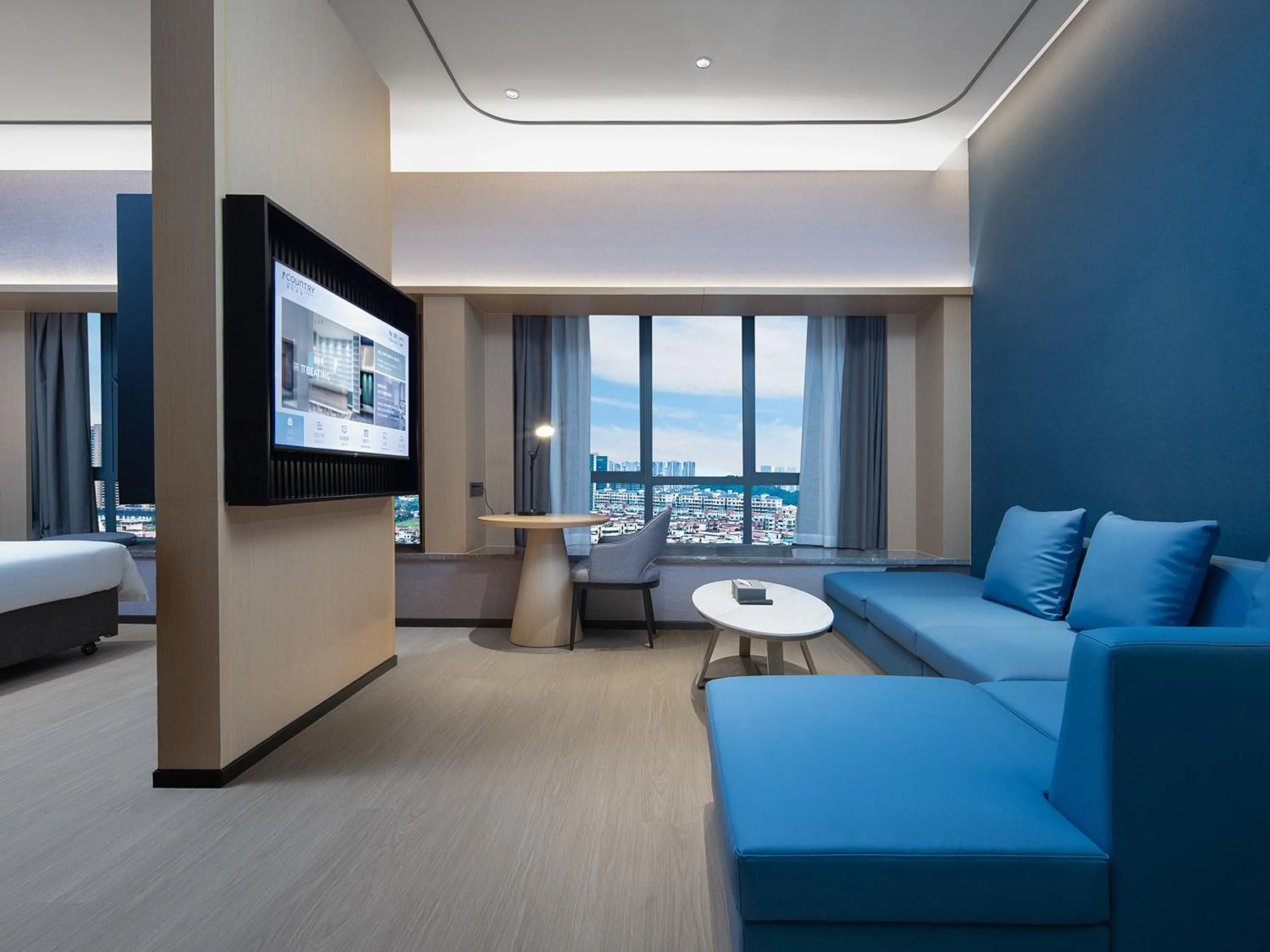 Seating area, Bed in 丽怡酒店 台山东门店 Country Inn & Suites by Radisson - Taishan East Branch