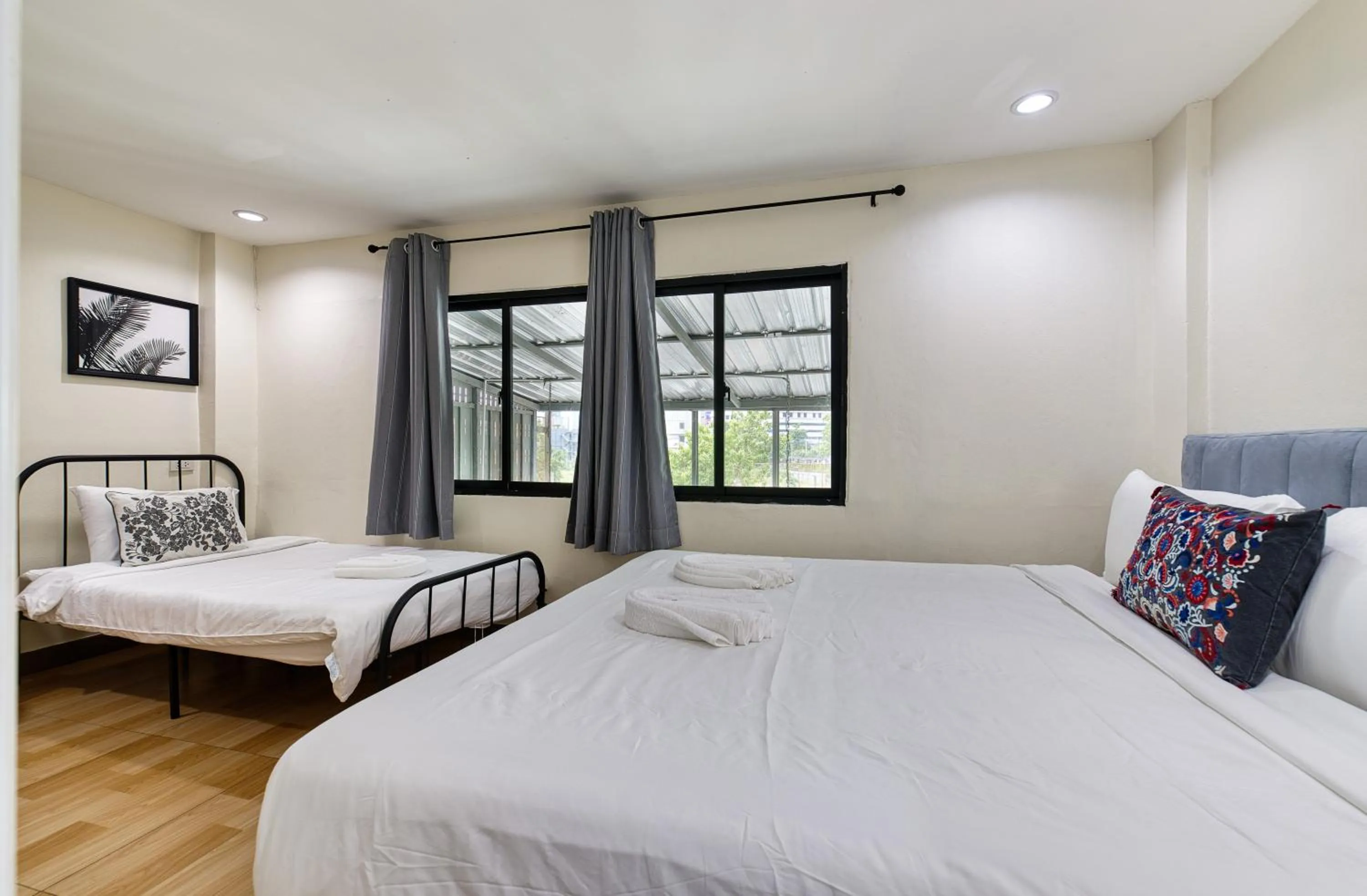 Bed in Bangkok Watergate Townhouse 曼谷中心水門家