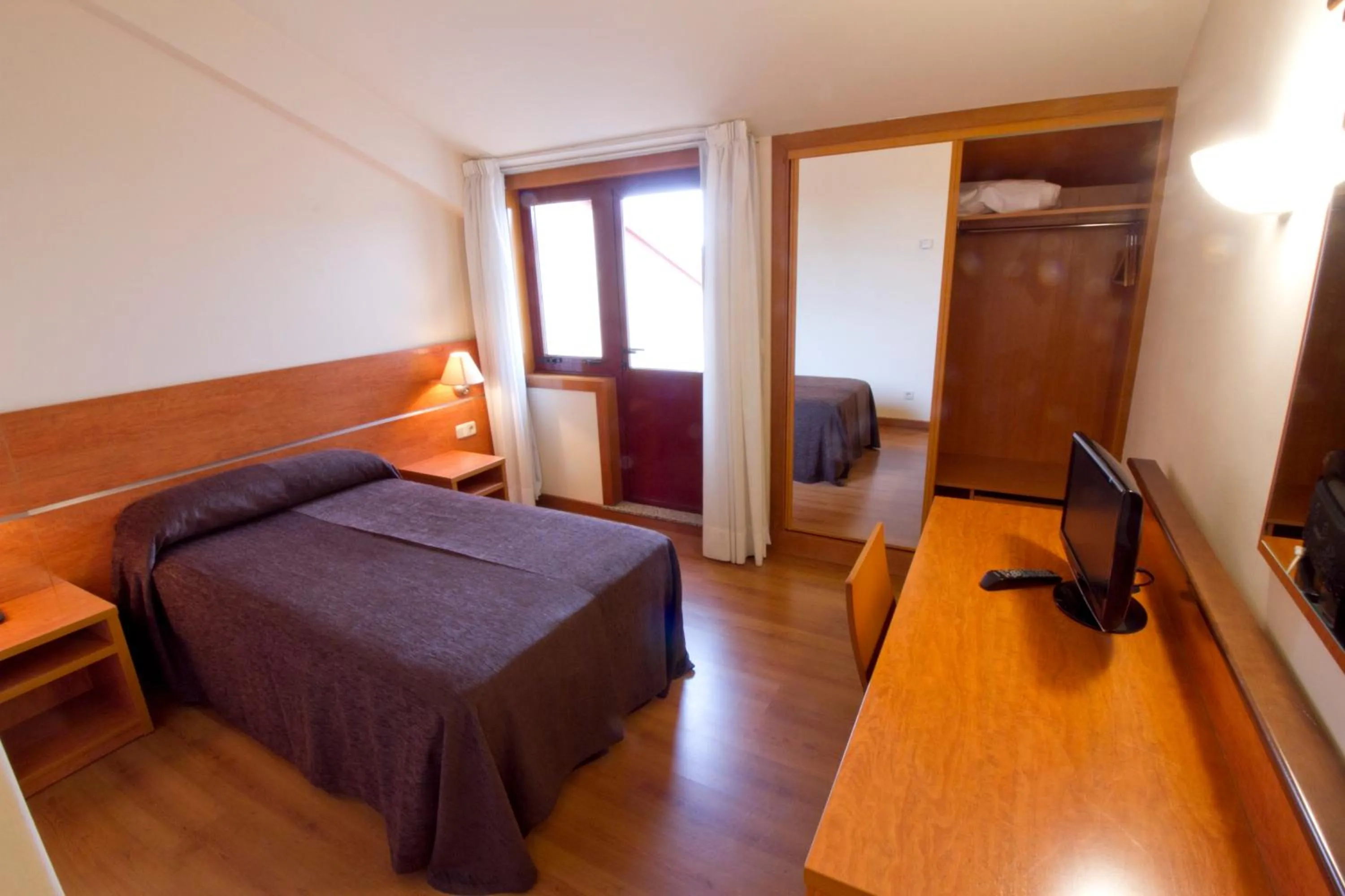 Bed in Hotel Torques