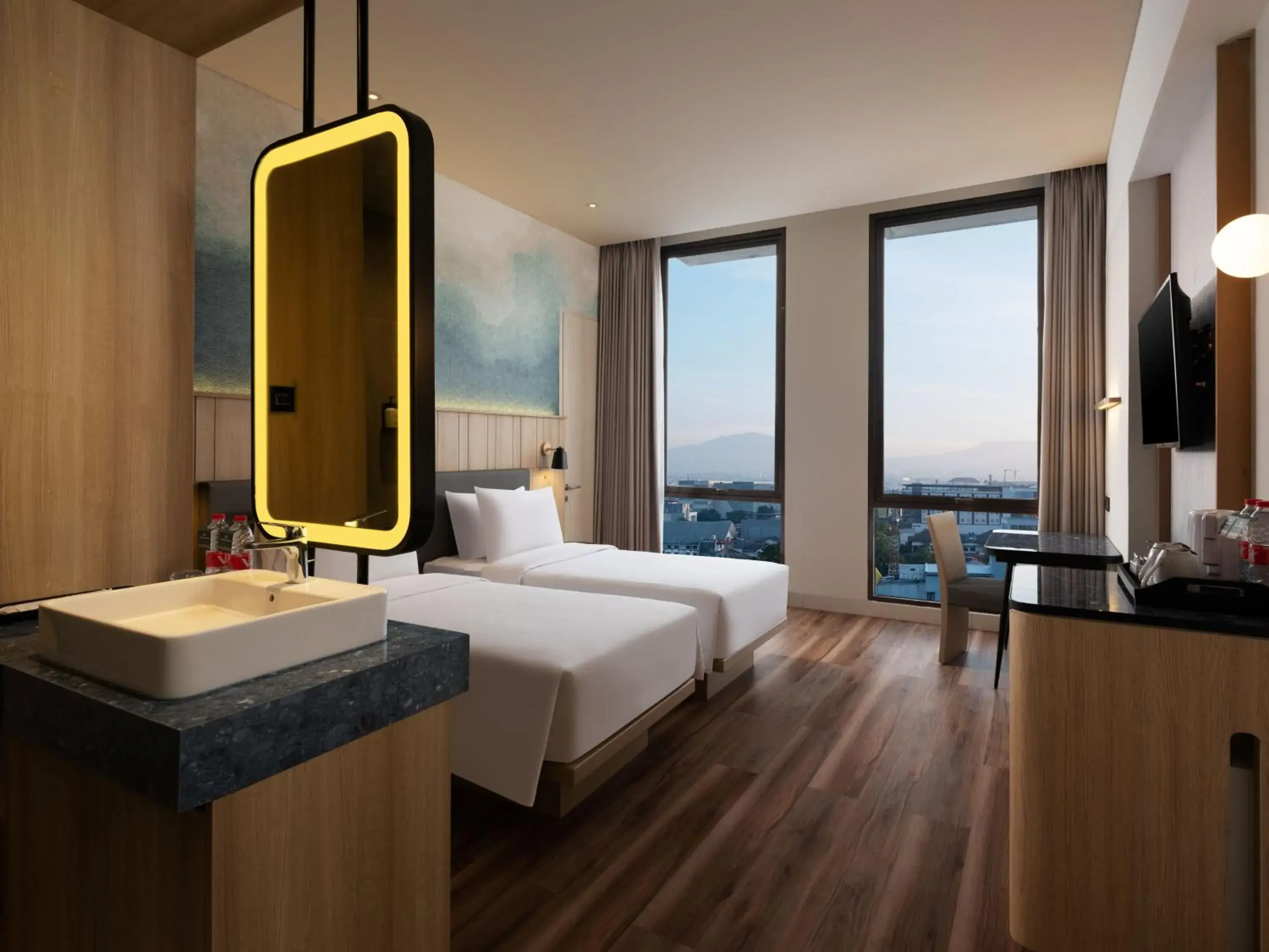 Deluxe Twin Room in Hotel Santika PasirKaliki Deluxe Twin Room in Hotel Santika PasirKaliki