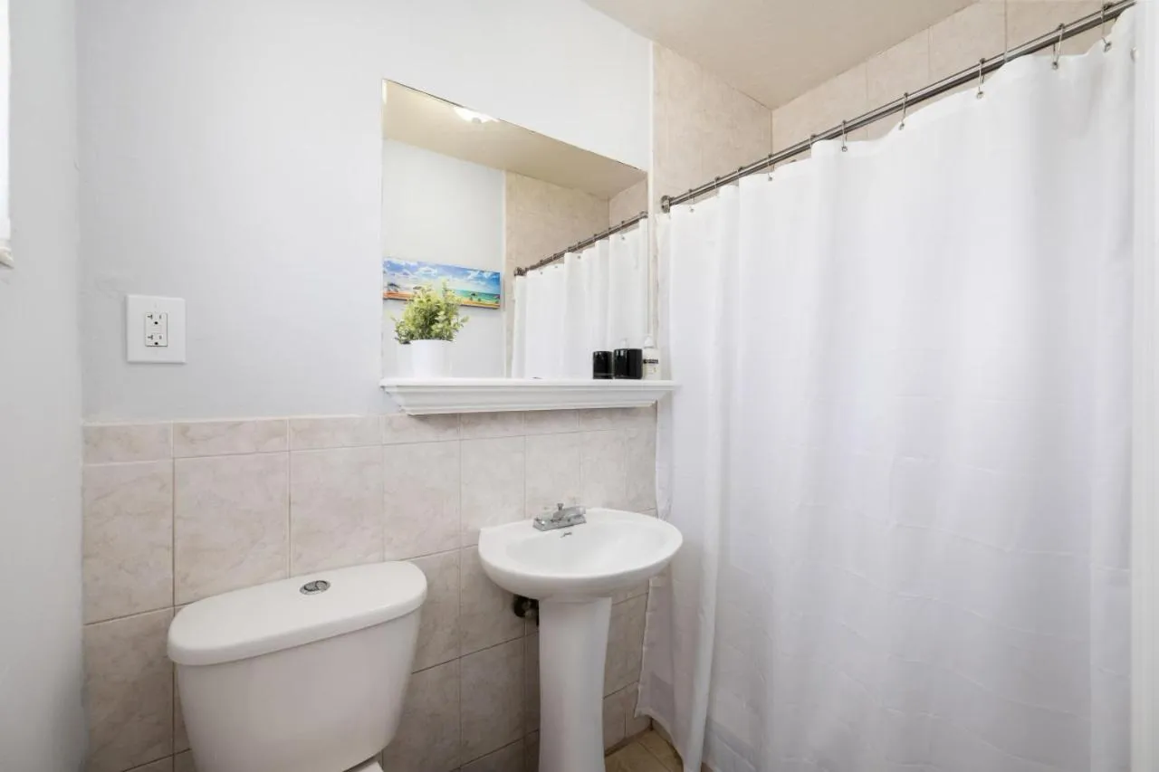 Shower in Cottage Bungalow Near Beach! King Bed with Pool & BBQ