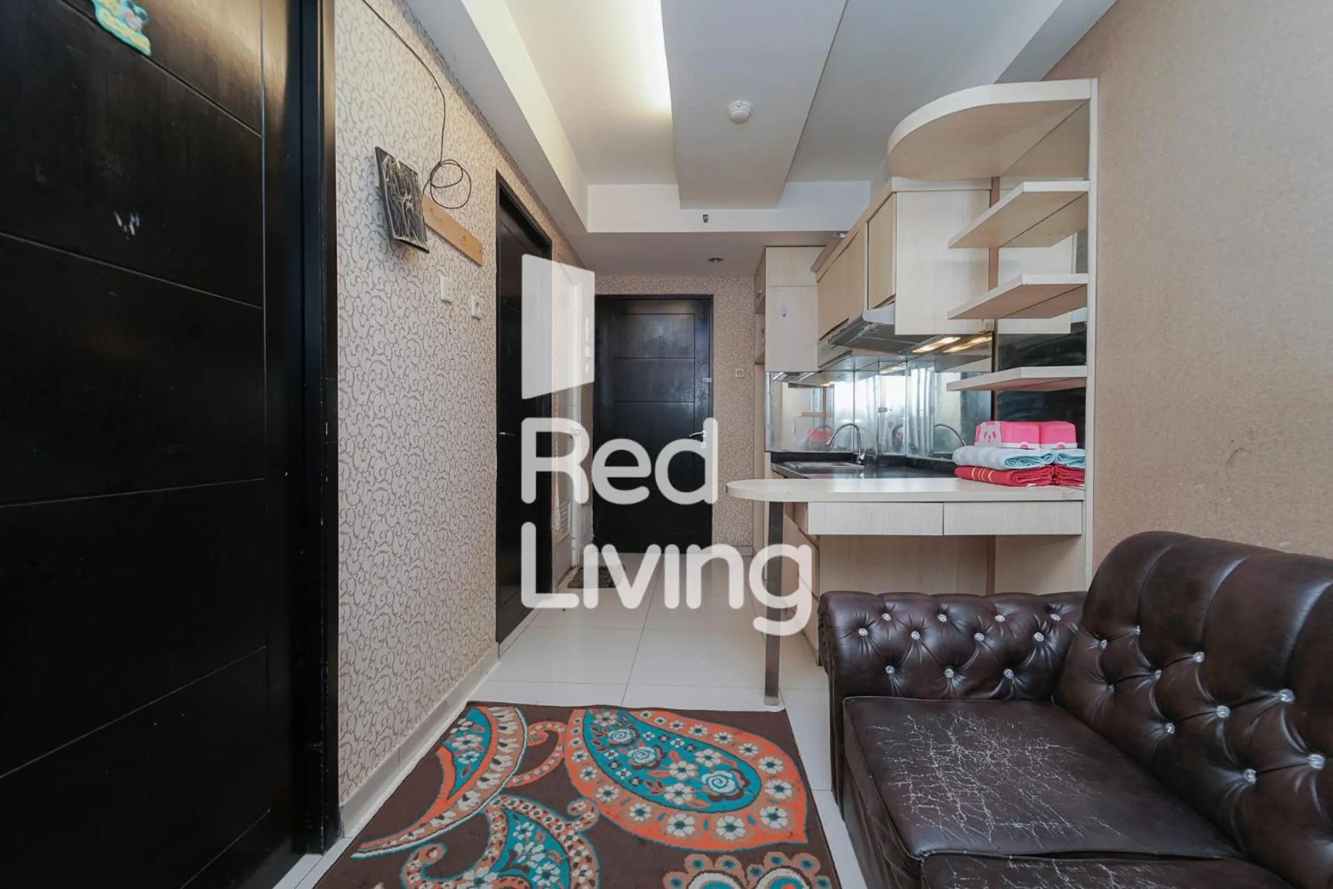 Living room in RedLiving Apartemen Paragon Village Karawaci - Ujang Rooms