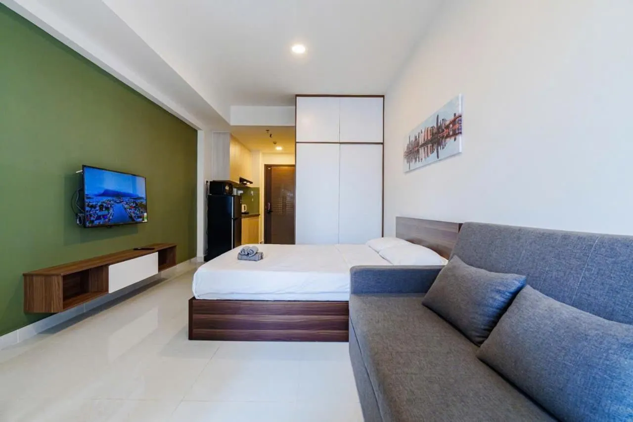 Bed in Otis Soho Saigon Balcony Apartment