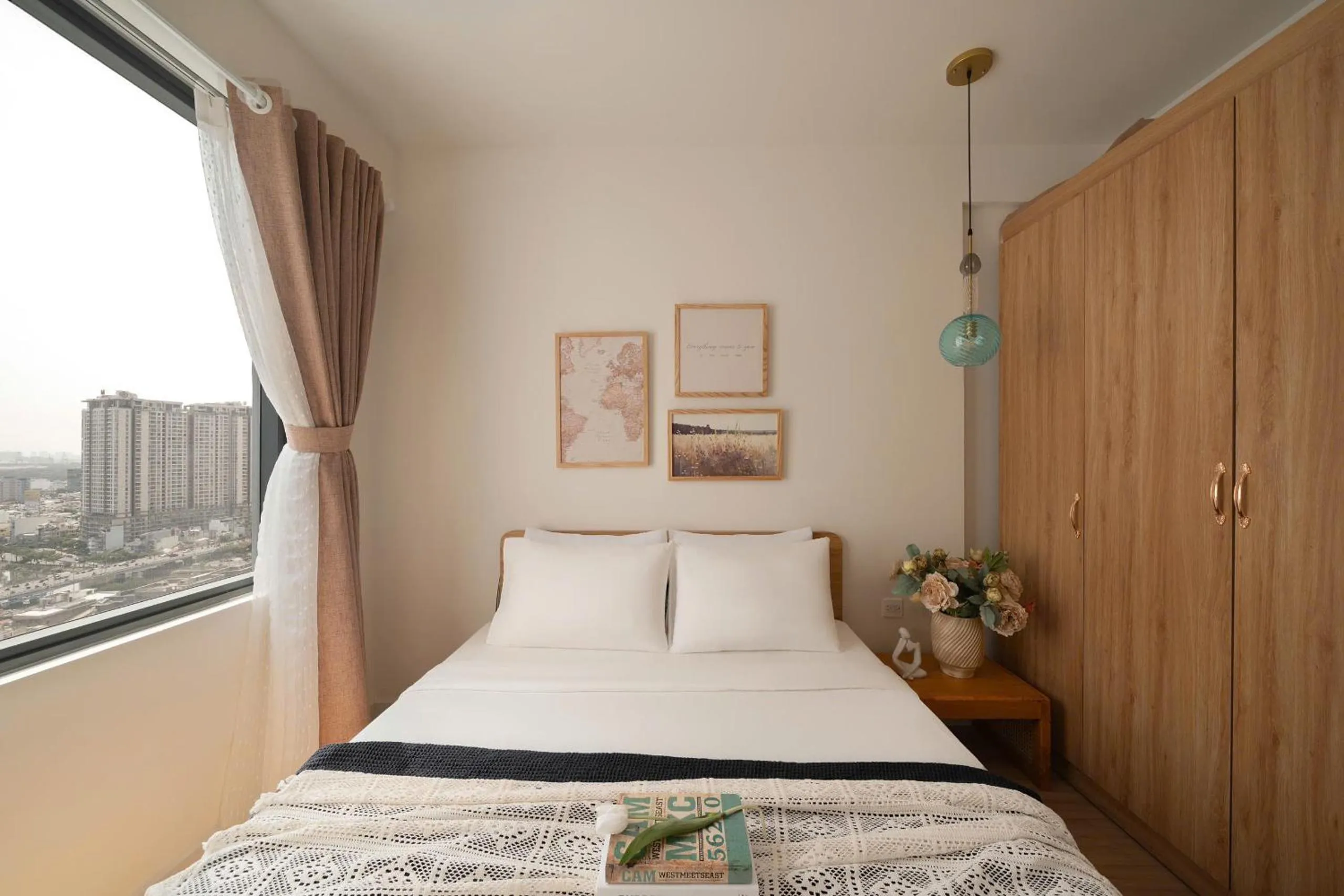 Bed in Otis Soho Saigon Balcony Apartment