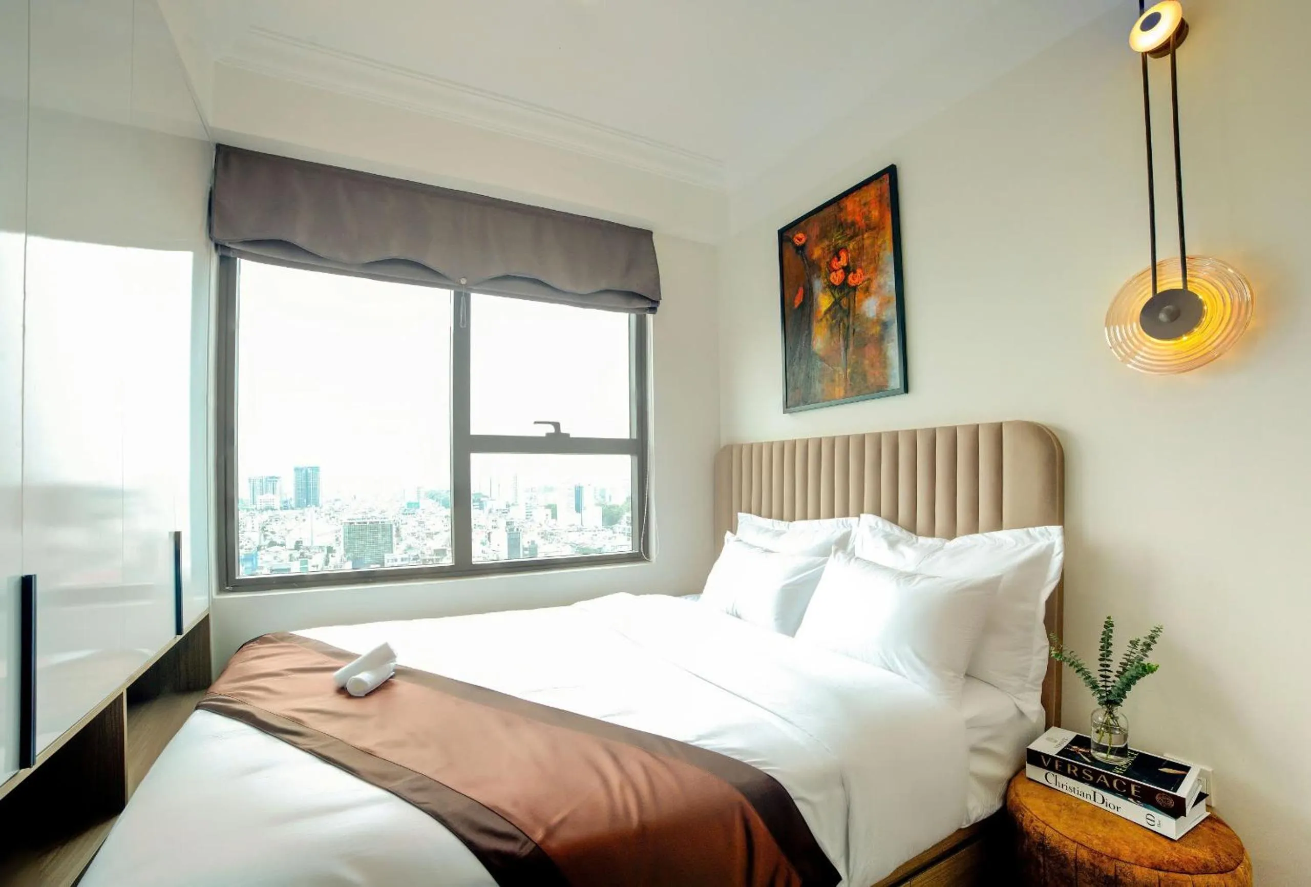 Bed in Otis Soho Saigon Balcony Apartment