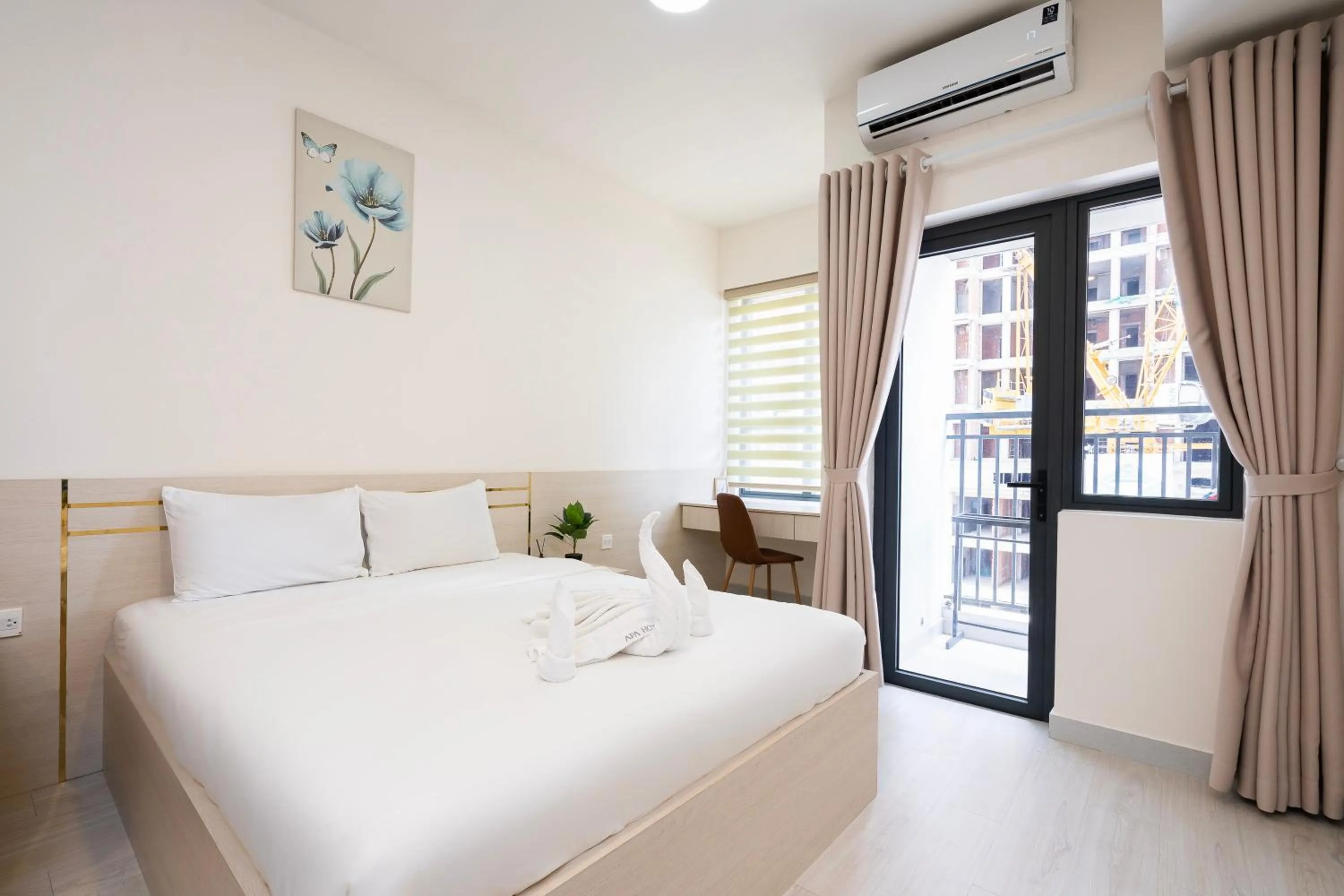 Bedroom, Bed in Otis Soho Saigon Balcony Apartment