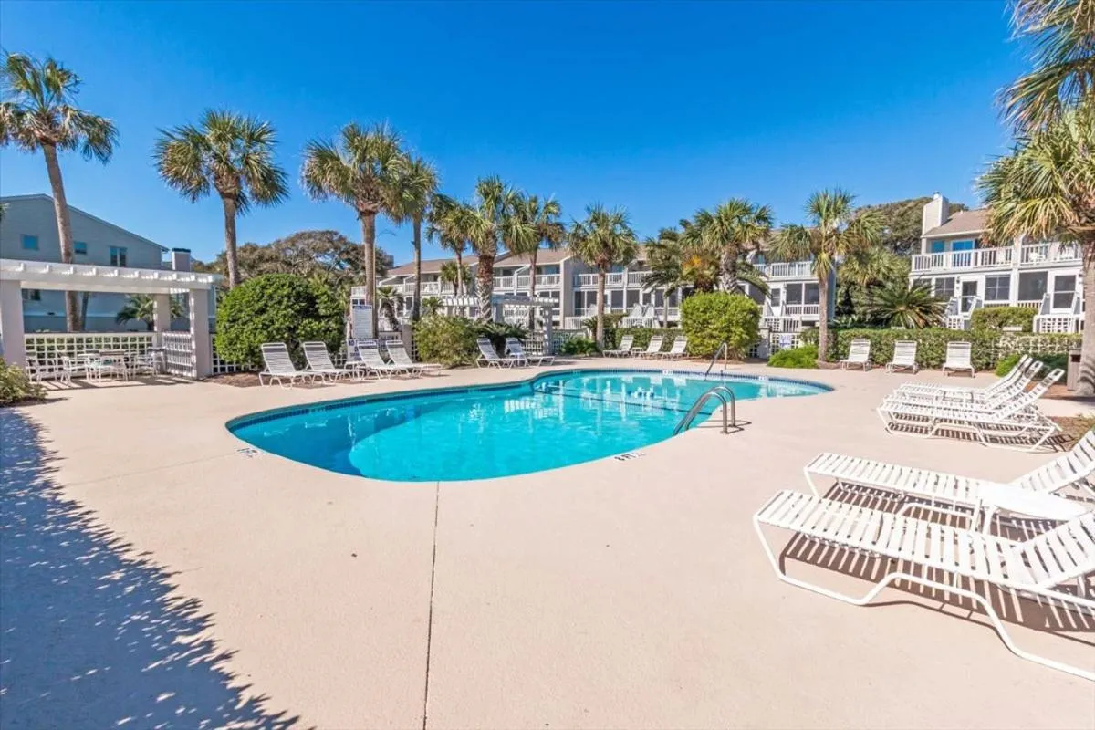 Pool view in Beach Club Villa 30 - Coastal Oceanfront! Pool! Walkout!