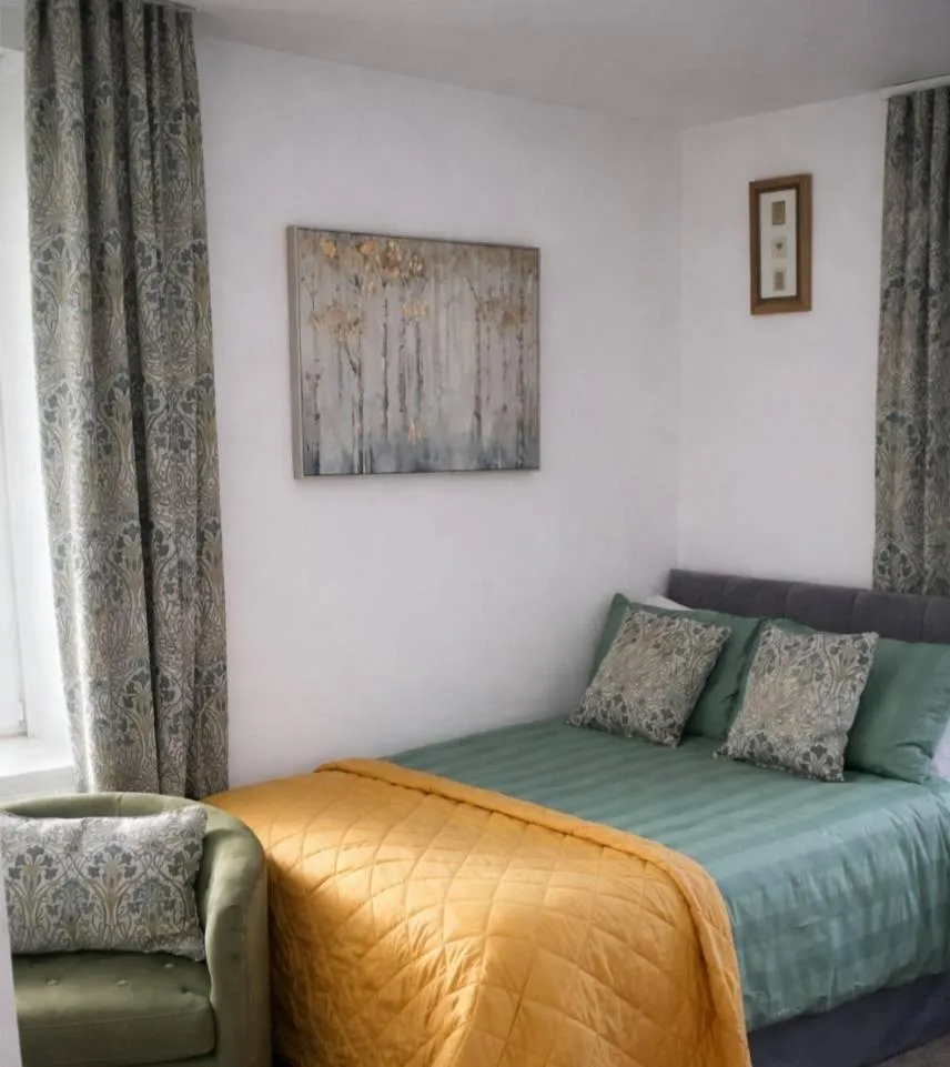 Bed in THE EARN HOTEL