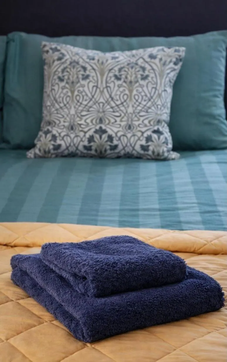 Bed in THE EARN HOTEL