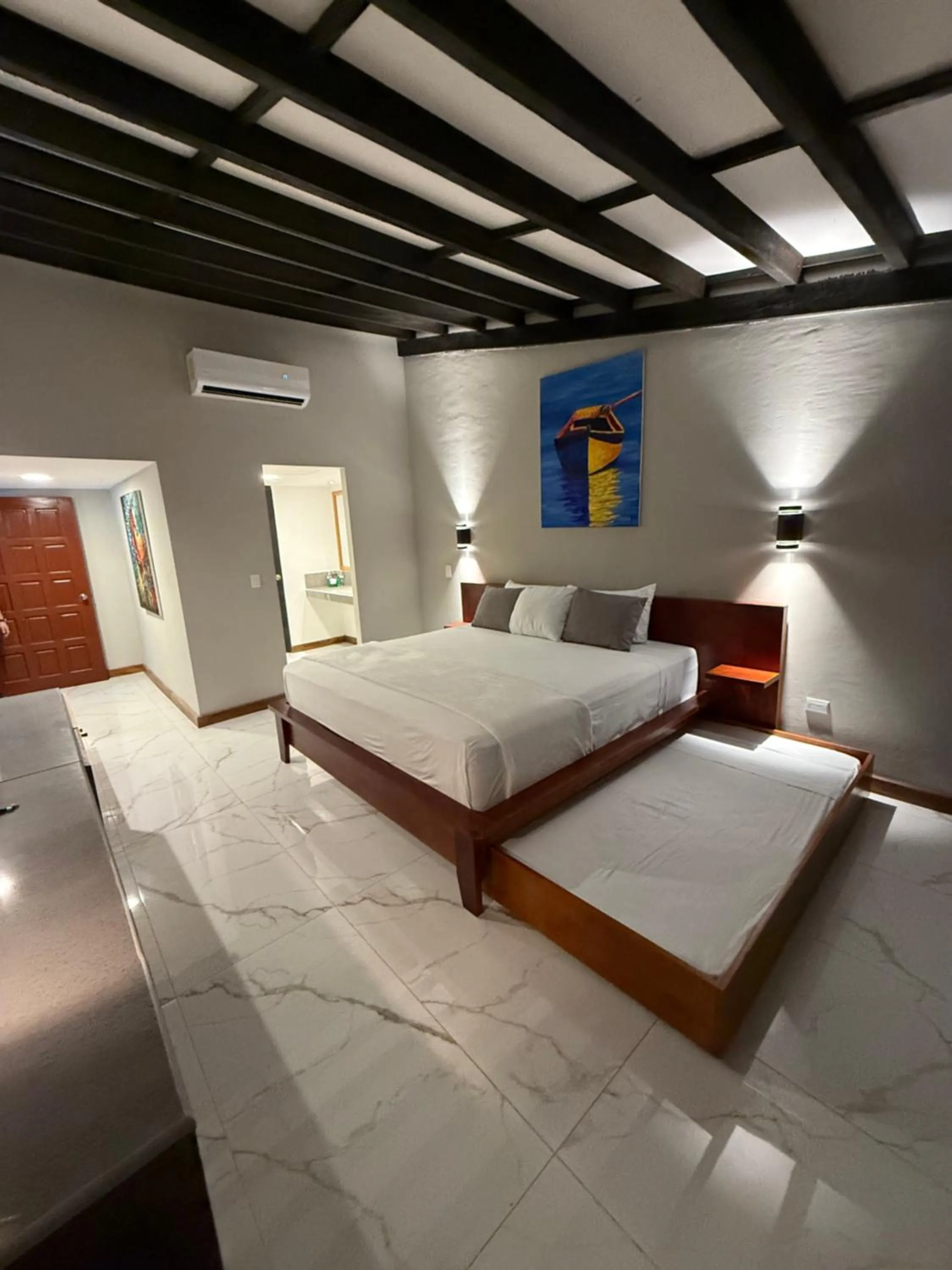 Bed in HOTEL TESORO BEACH