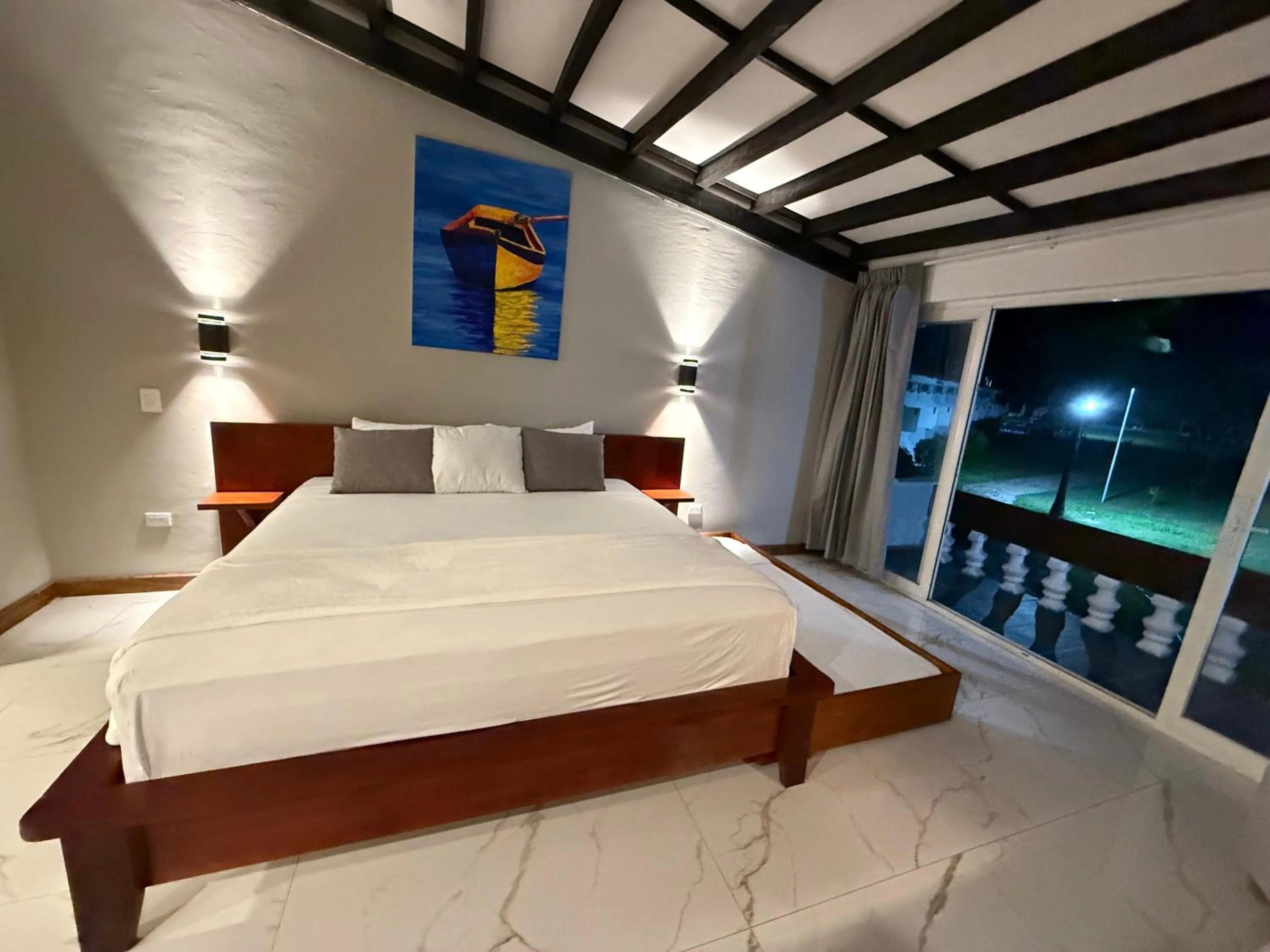 Bed in HOTEL TESORO BEACH