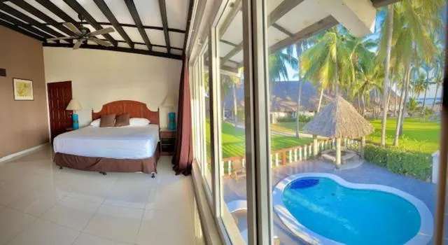 Bed in HOTEL TESORO BEACH