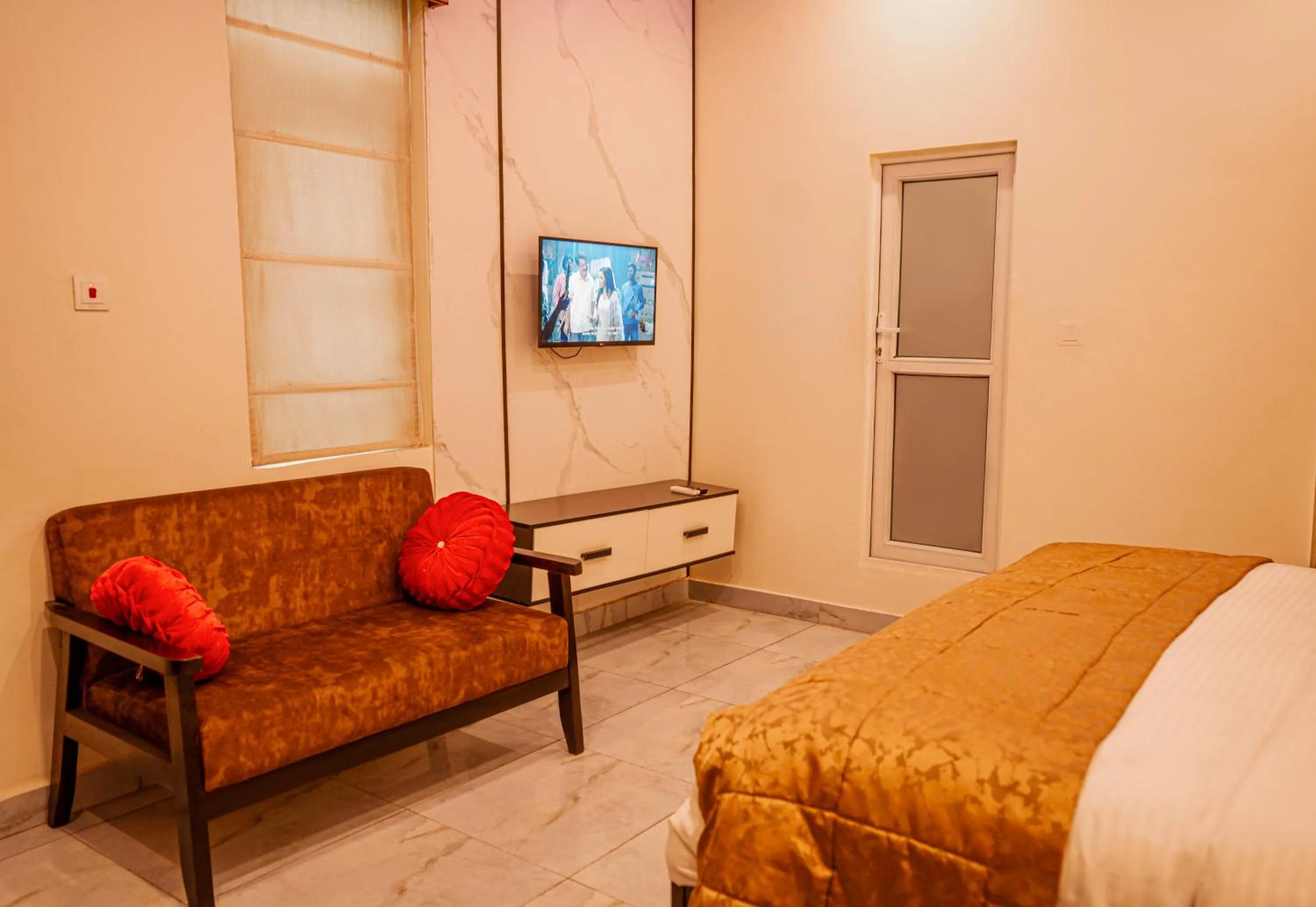 Bed in Providha Hotel & Suites