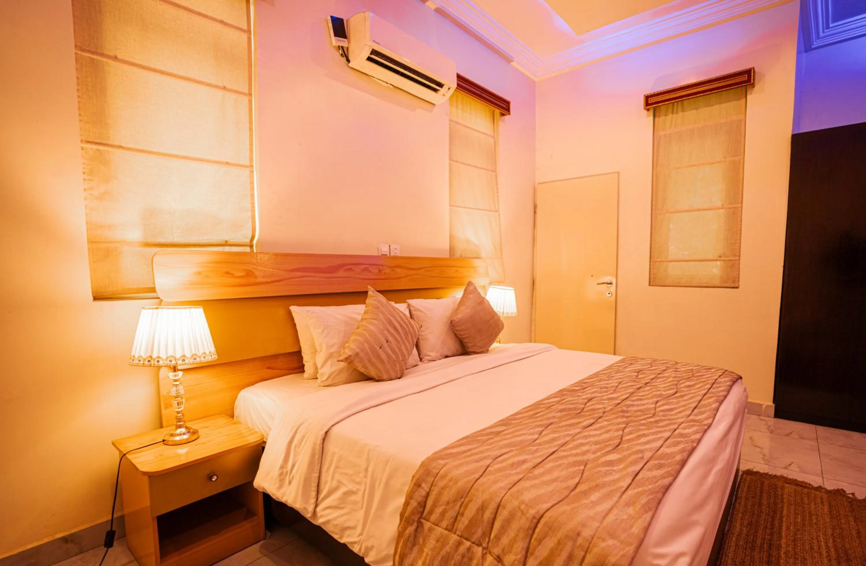 Bed in Providha Hotel & Suites